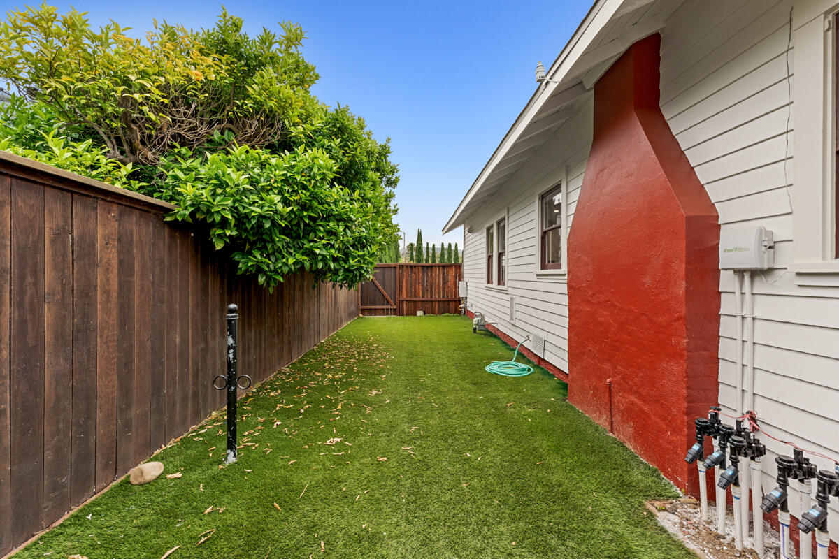 1309 Castillo Street Santa Barbara, CA 93101 - Photo 32 of 41 a backyard of a house with lots of green space