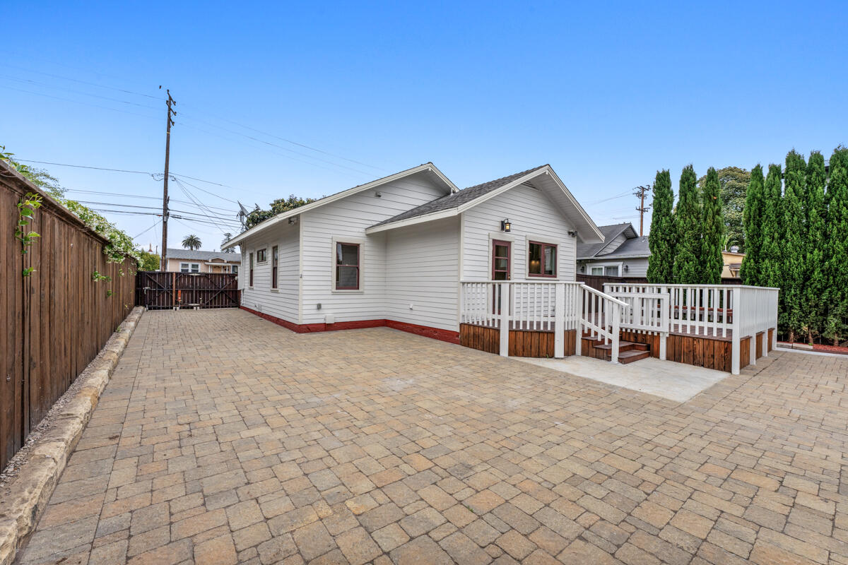 1309 Castillo Street Santa Barbara, CA 93101 - Photo 37 of 41 a view of a house with a wooden fence