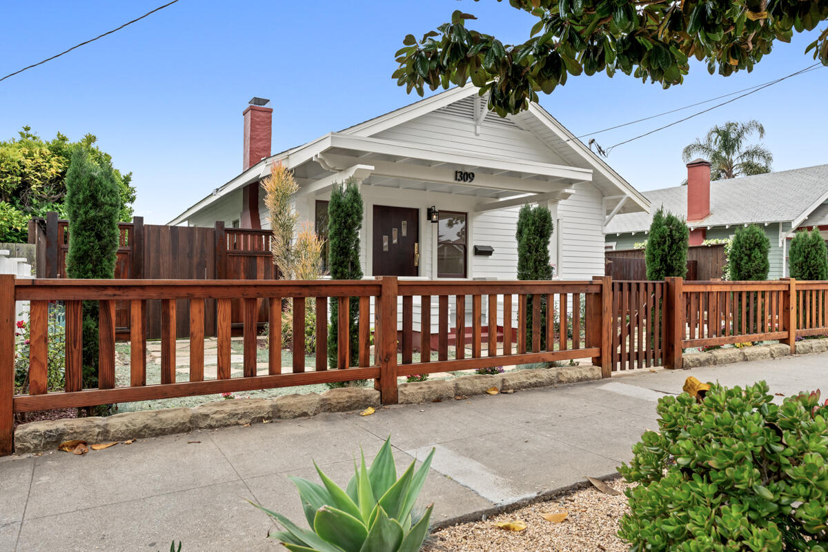 1309 Castillo Street Santa Barbara, CA 93101 - Photo 4 of 41 a view of a house with a small yard and wooden fence