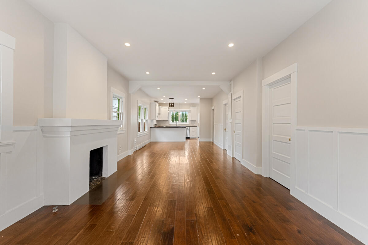 1309 Castillo Street Santa Barbara, CA 93101 - Photo 10 of 41 a view of a living room a wooden floor and a fireplace