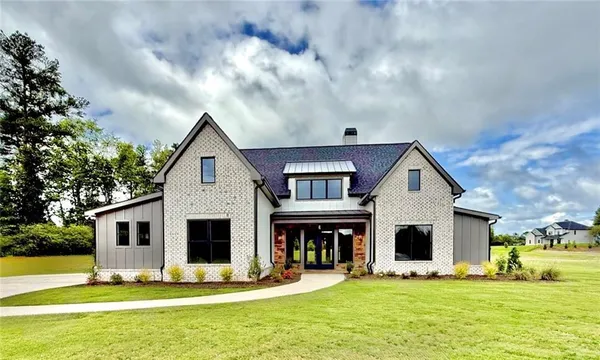 a front view of house with yard