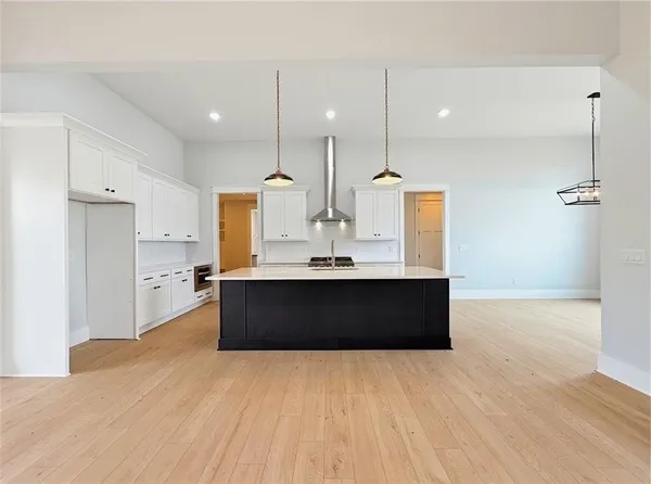 a view of a big room with carpet