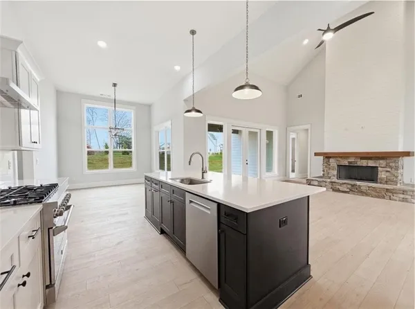 an empty room with windows and entrance