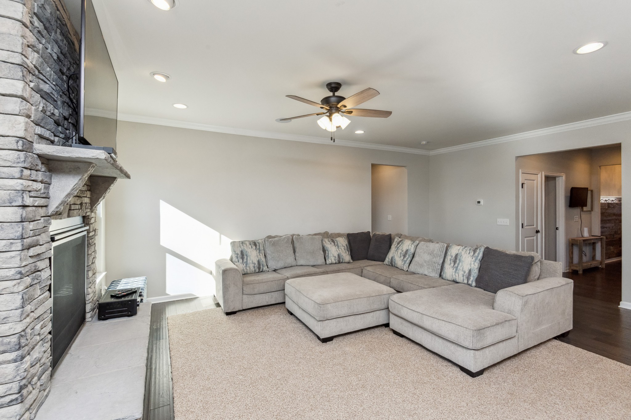 6820 Falls Ridge Lane College Grove, TN 37046 - Photo 13 of 46 a living room with furniture and a fireplace