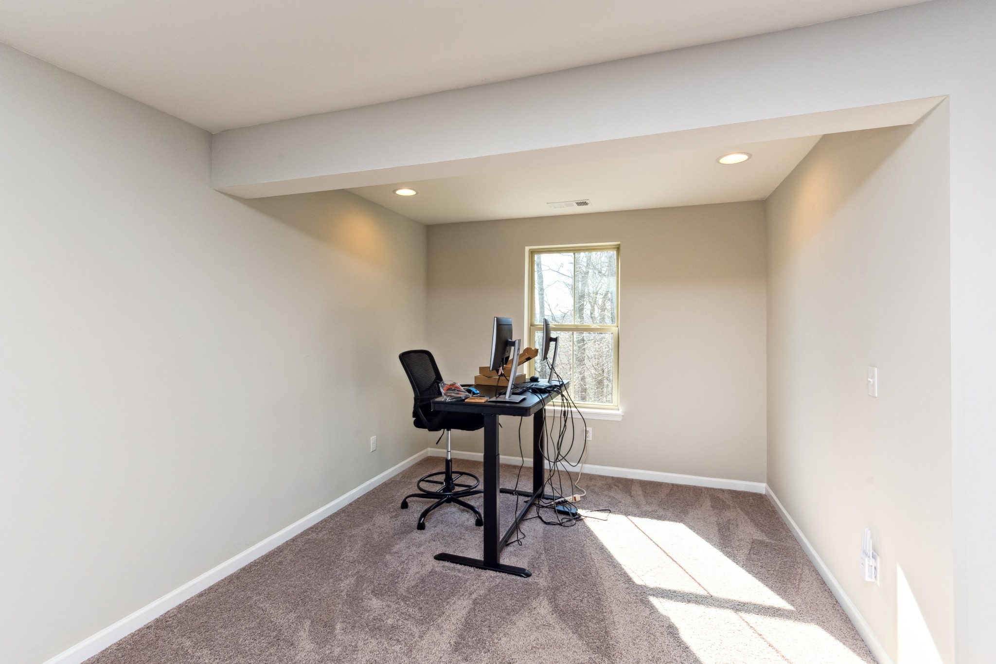 6820 Falls Ridge Lane College Grove, TN 37046 - Photo 31 of 46 a view of a workspace with furniture and a window