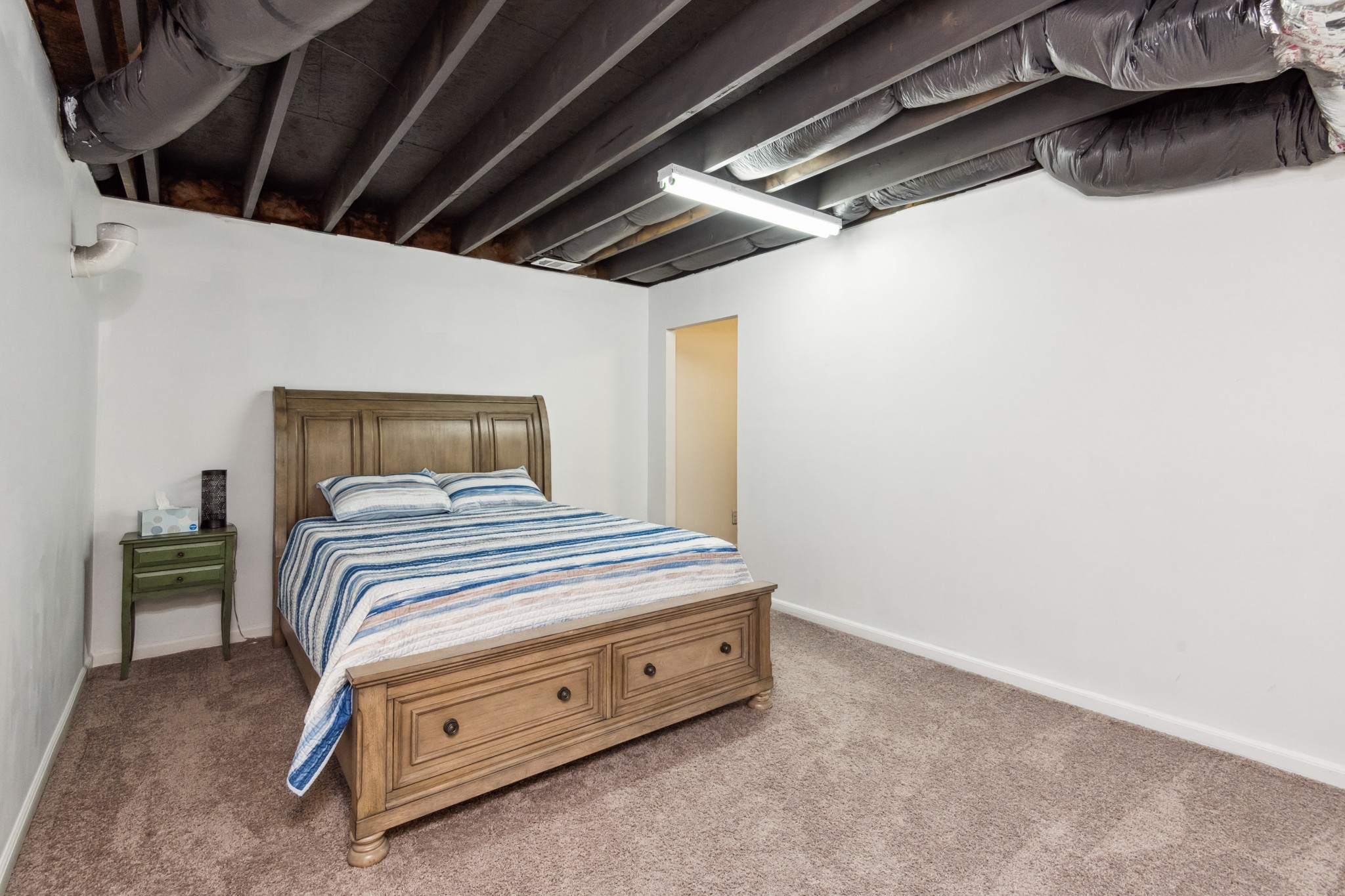 6820 Falls Ridge Lane College Grove, TN 37046 - Photo 43 of 46 a bedroom with a bed and a chair