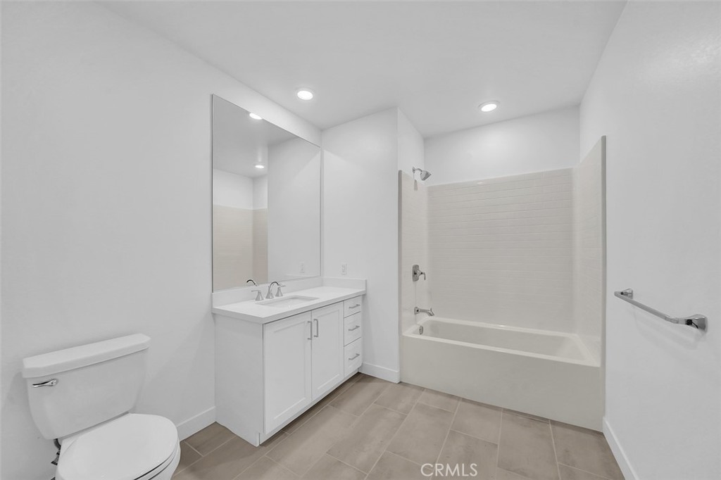 2708 Rivington Irvine, CA 92612 - Photo 15 of 24 a bathroom with a sink a toilet and shower