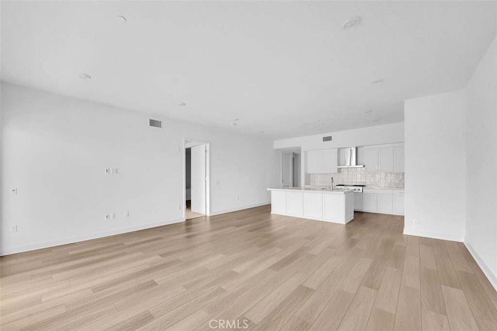 2708 Rivington Irvine, CA 92612 - Photo 4 of 24 a view of kitchen with furniture and wooden floor