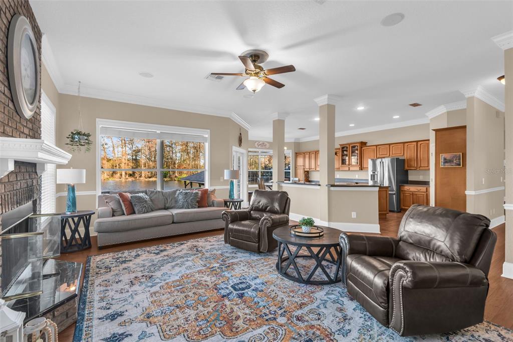 1425 Riviera Drive Kissimmee, FL 34744 - Photo 12 of 82 a living room with furniture and a chandelier