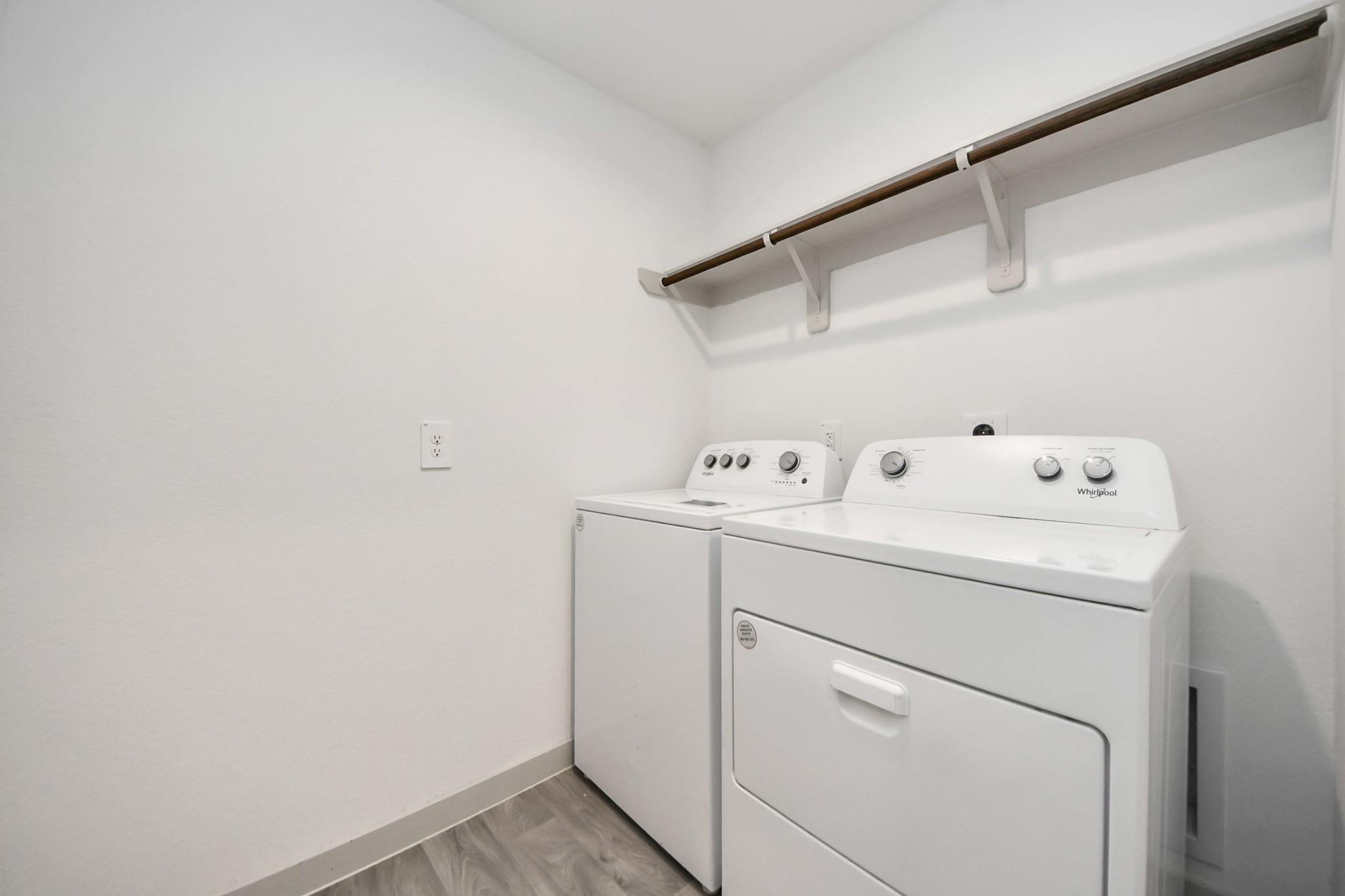 7806 Cattleman Vly Drive Rosharon, TX 77583 - Photo 21 of 40 a view of storage and utility room with washer and dryer
