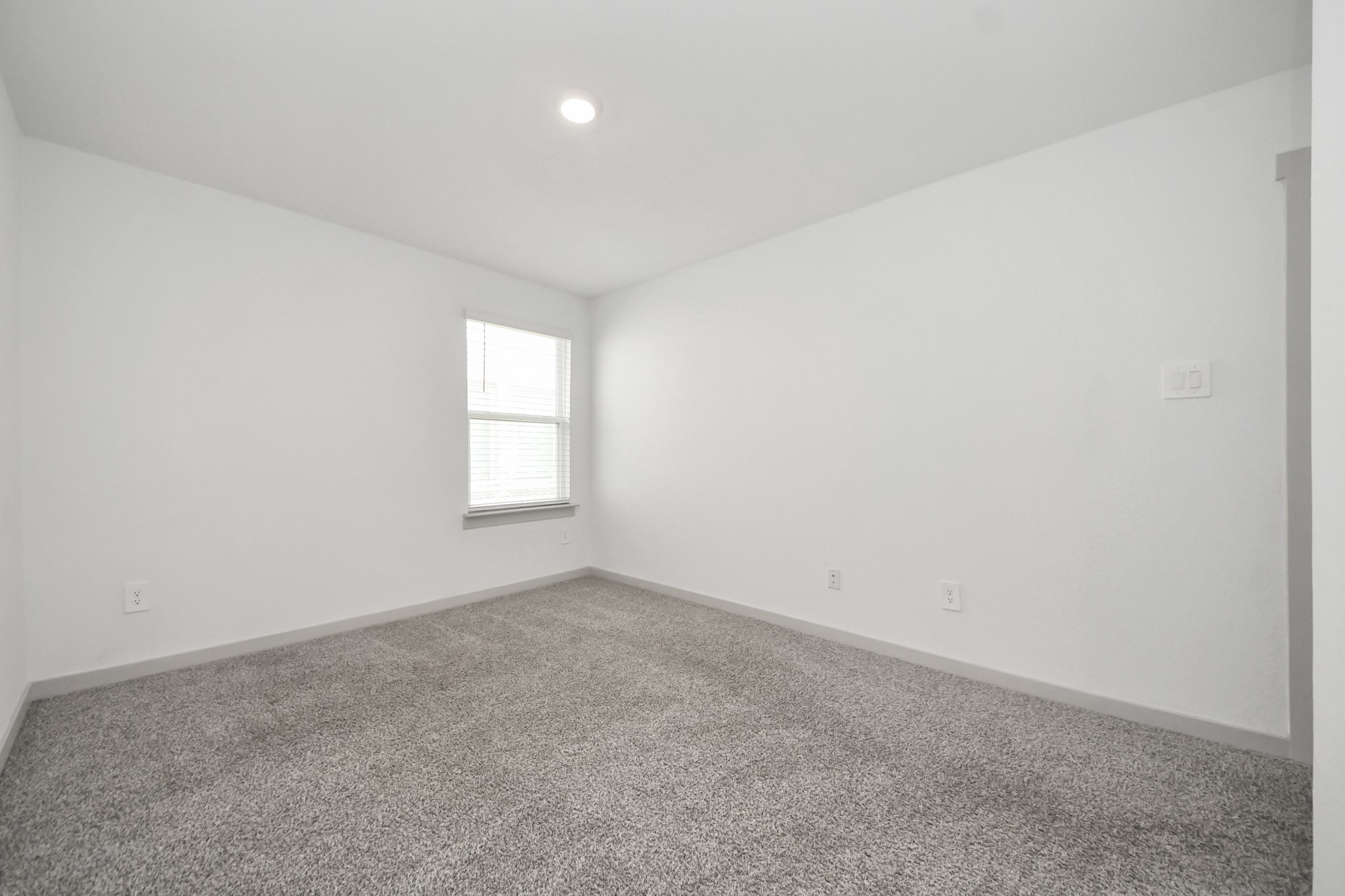 7806 Cattleman Vly Drive Rosharon, TX 77583 - Photo 24 of 40 an empty room with a window