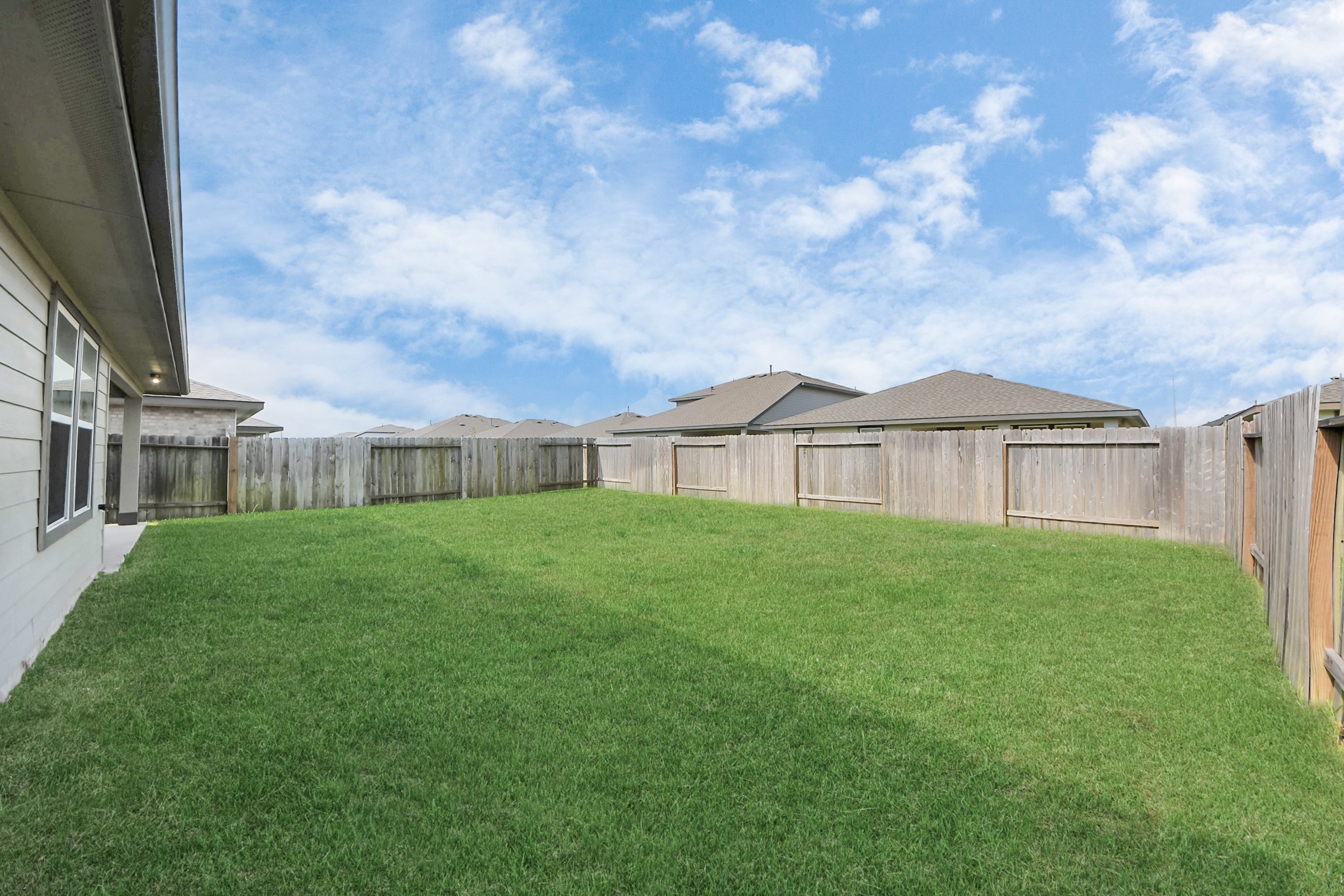 7806 Cattleman Vly Drive Rosharon, TX 77583 - Photo 35 of 40 a view of a house with backyard and garden