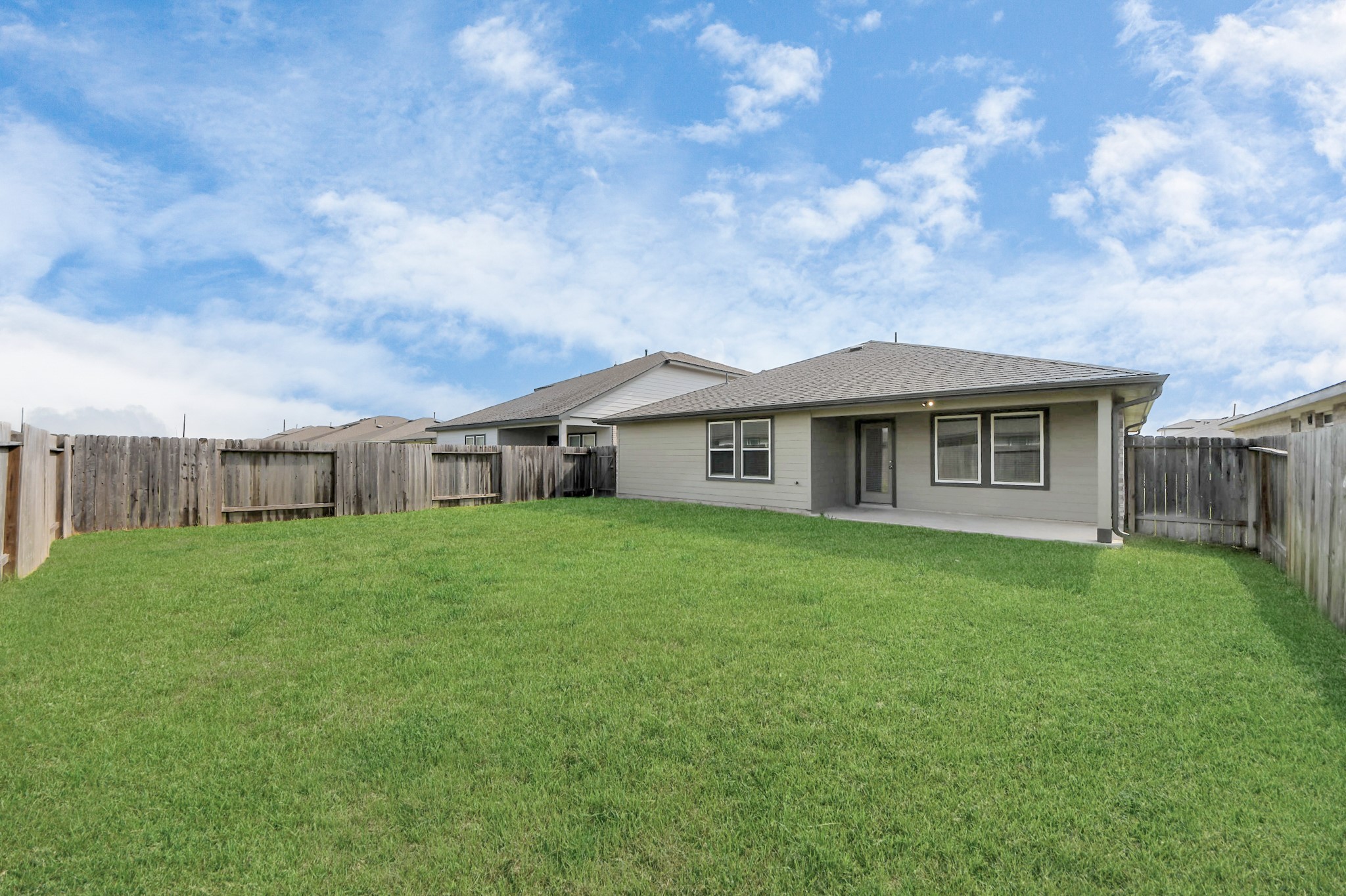 7806 Cattleman Vly Drive Rosharon, TX 77583 - Photo 37 of 40 a aerial view of a house next to a yard with wooden fence