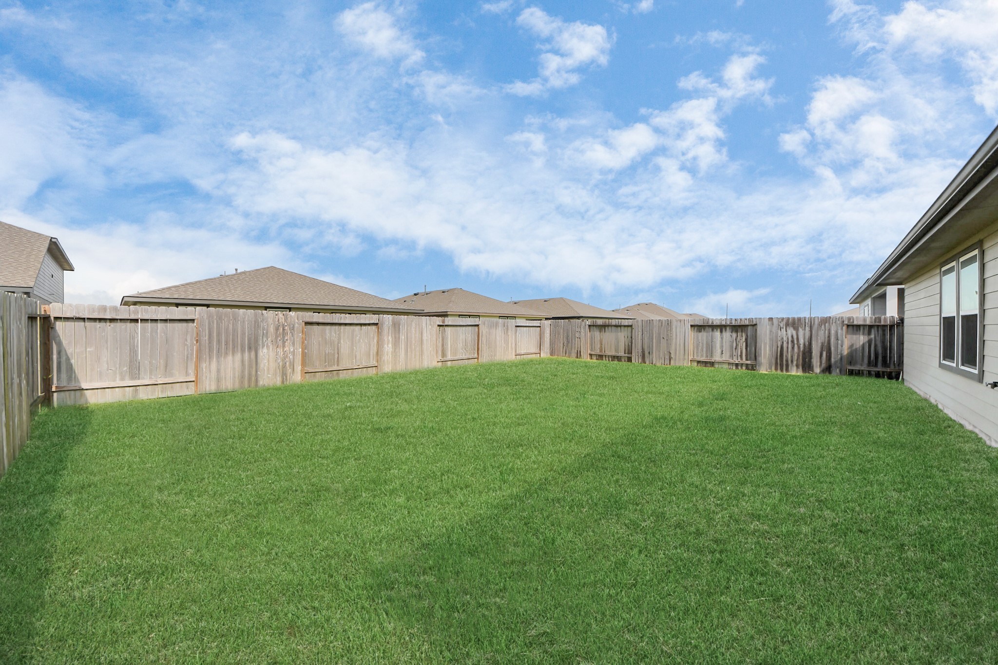 7806 Cattleman Vly Drive Rosharon, TX 77583 - Photo 38 of 40 a view of a house with backyard and garden