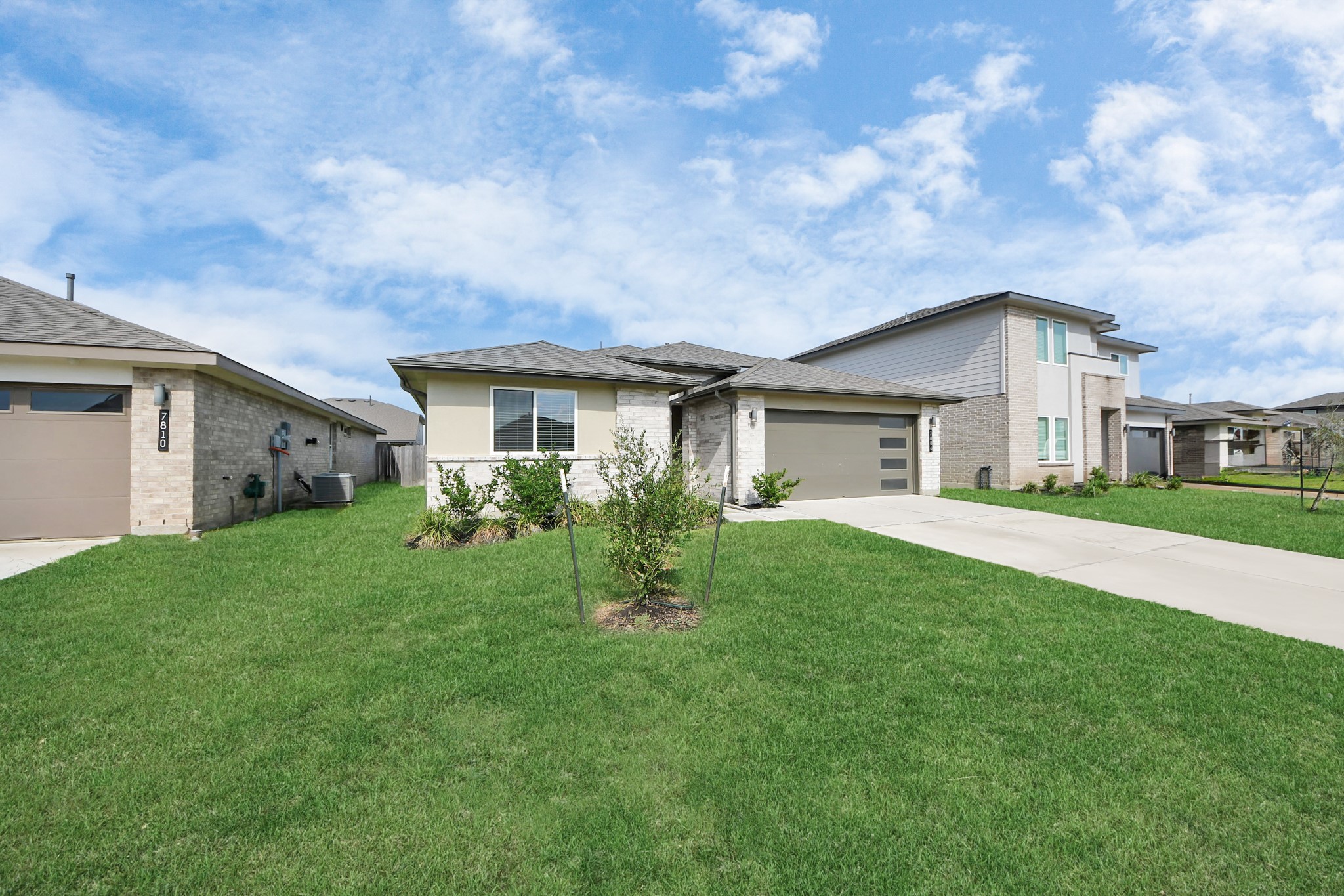 7806 Cattleman Vly Drive Rosharon, TX 77583 - Photo 4 of 40 a view of house with a big yard and large trees