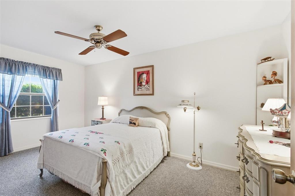 24 Chippeway Court Palm Coast, FL 32137 - Photo 26 of 69 a bedroom with a bed and a window