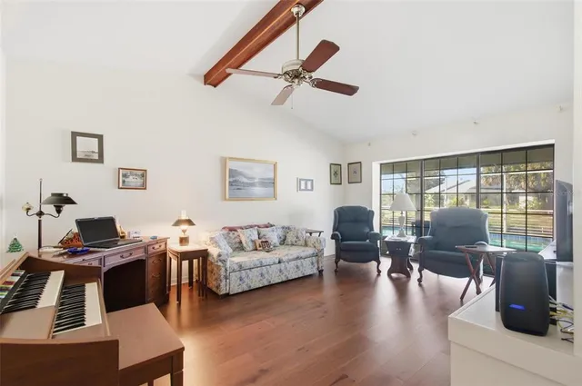 a kitchen with stainless steel appliances white cabinets and a stove top oven