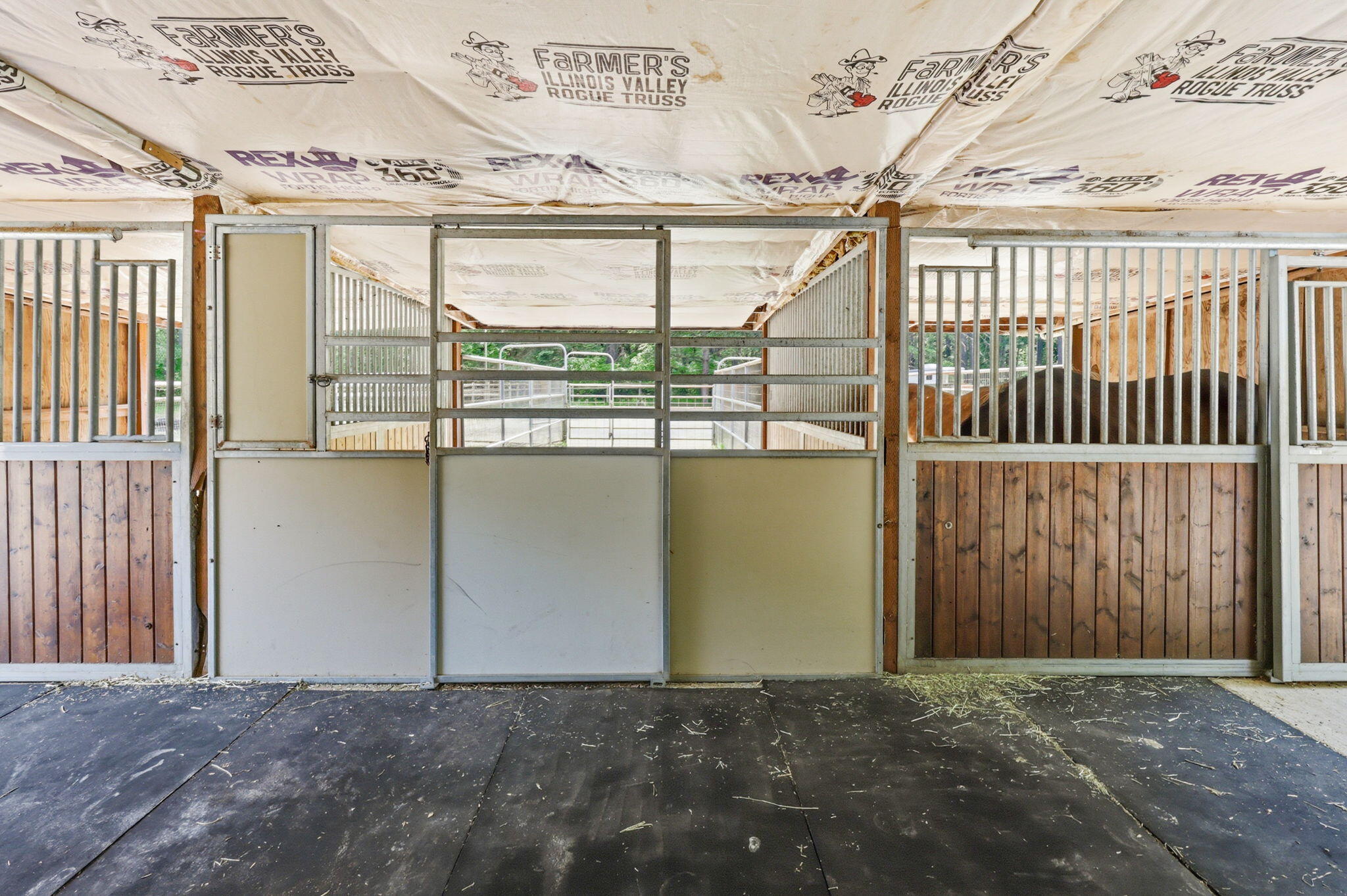 985 Elliott Creek Road Wilderville, OR 97543 - Photo 78 of 98 a view of a porch with a floor to ceiling window