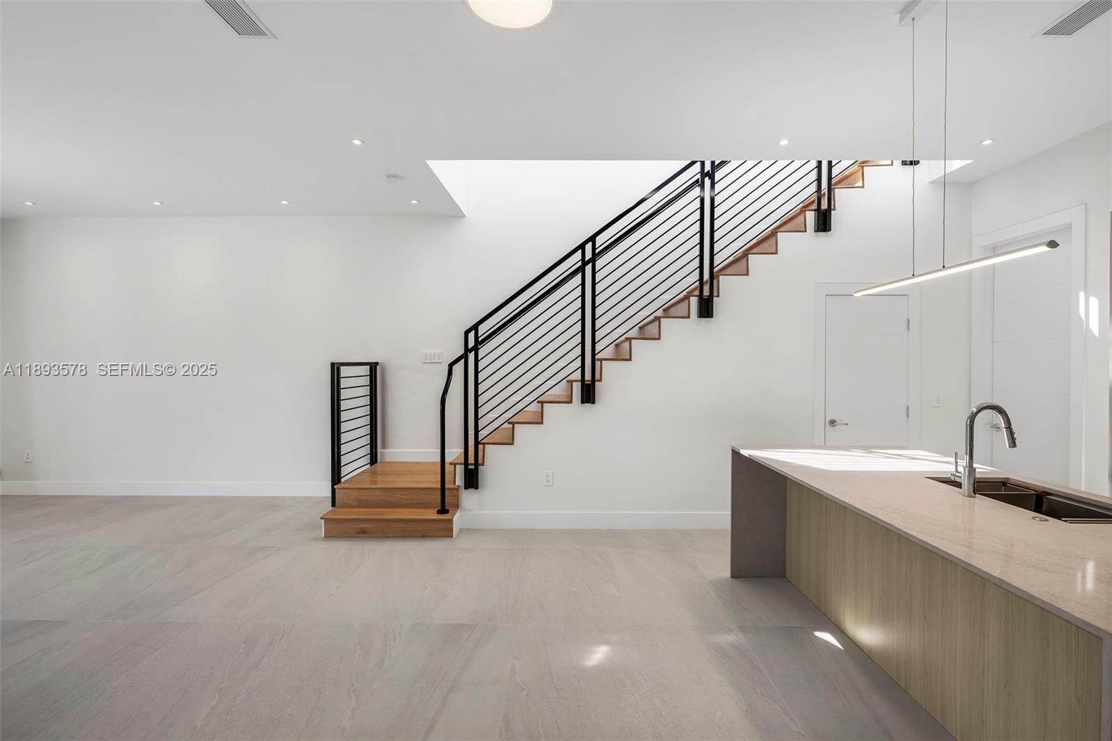3300 Southwest 27th Terrace, Unit 3300 Miami, FL 33133 - Photo 21 of 76 a view of entryway and kitchen