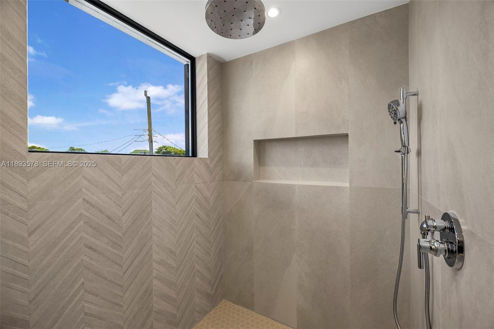 3300 Southwest 27th Terrace, Unit 3300 Miami, FL 33133 - Photo 38 of 76 a bathroom with a shower