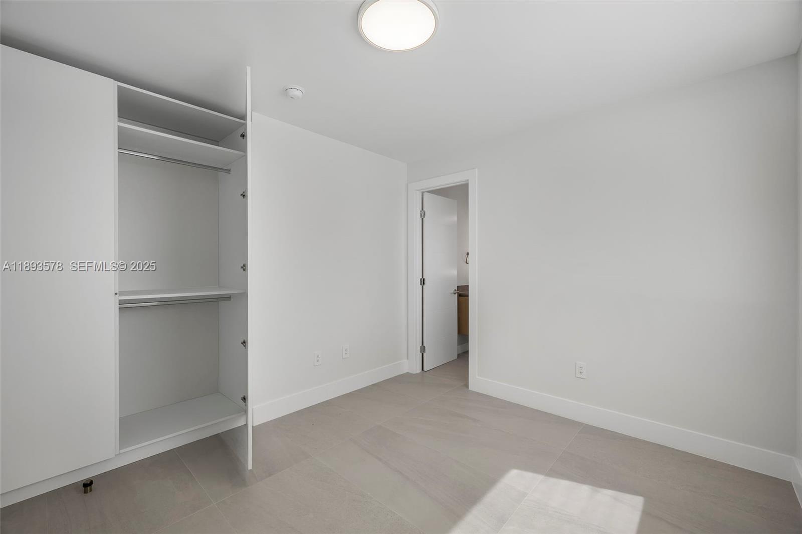 3300 Southwest 27th Terrace, Unit 3300 Miami, FL 33133 - Photo 53 of 76 a view of an empty room