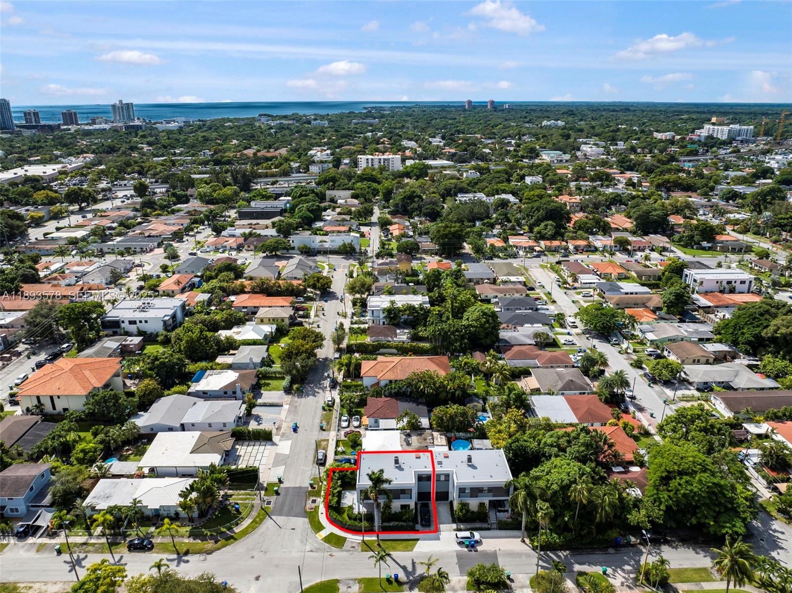 3300 Southwest 27th Terrace, Unit 3300 Miami, FL 33133 - Photo 65 of 76 an aerial view of a city with lots of residential buildings