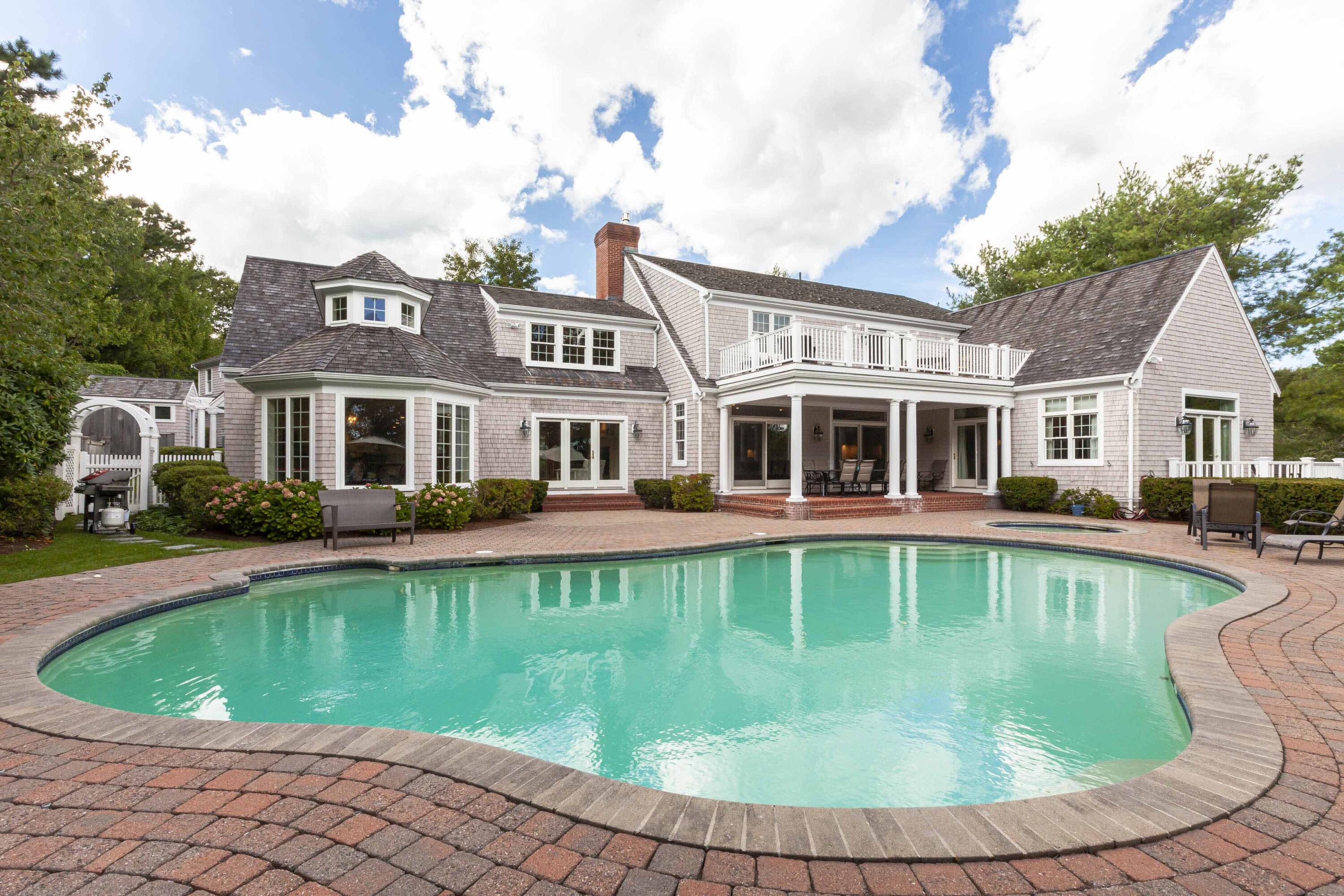 375 Baxter Neck Road Marstons Mills, MA 02648 - Photo 13 of 62 a view of a house with a swimming pool