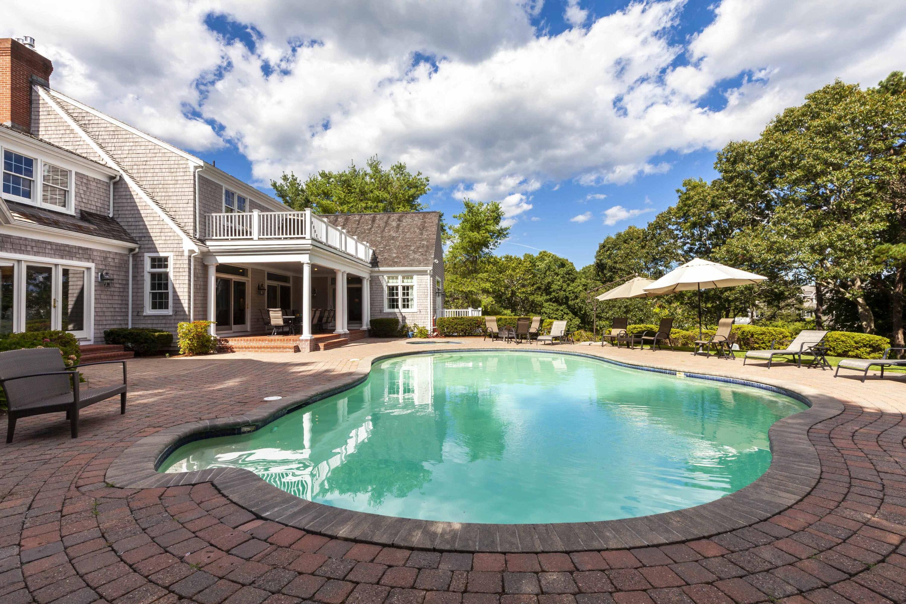 375 Baxter Neck Road Marstons Mills, MA 02648 - Photo 14 of 62 a view of a house with swimming pool and sitting area
