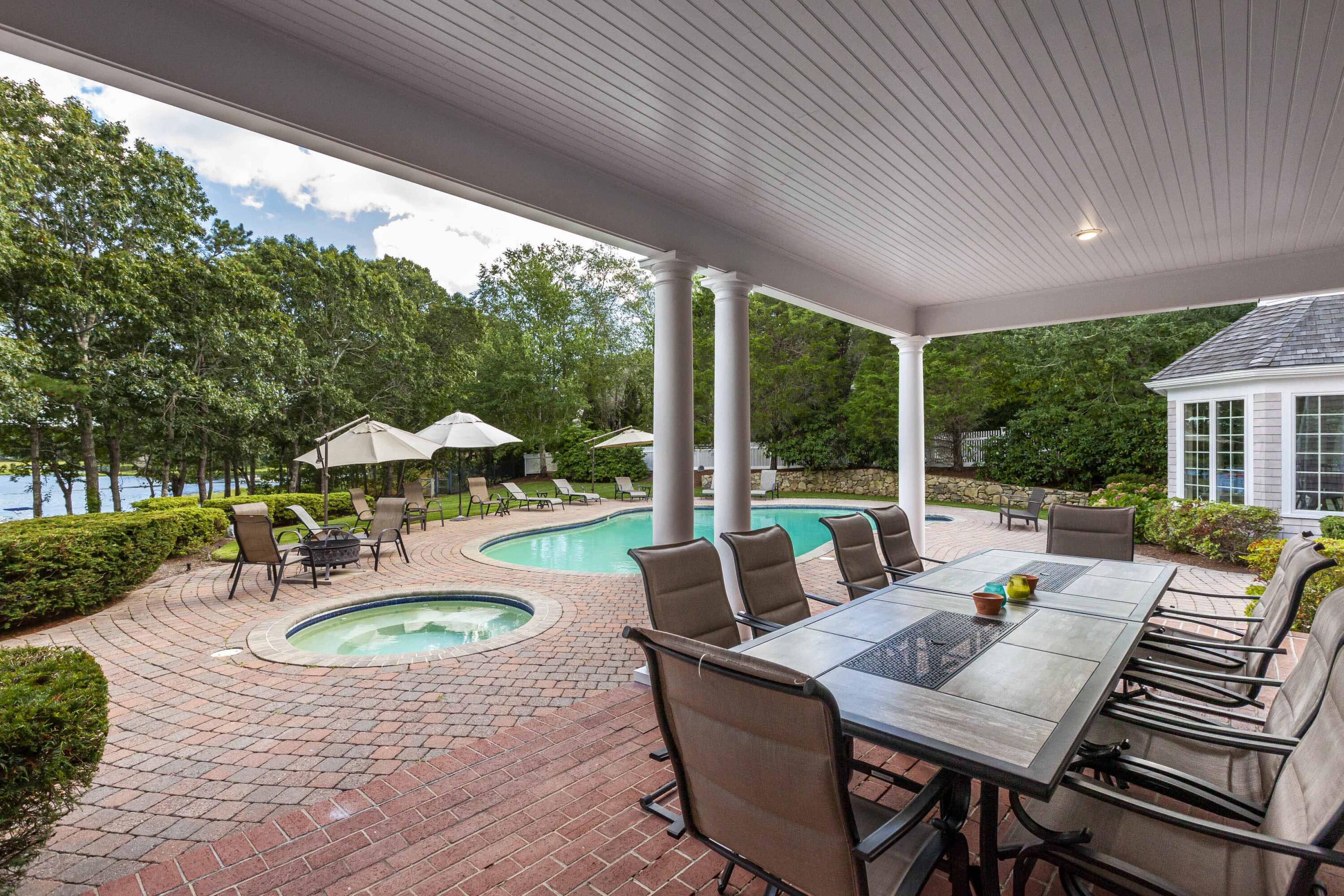 375 Baxter Neck Road Marstons Mills, MA 02648 - Photo 15 of 62 a view of a patio with furniture