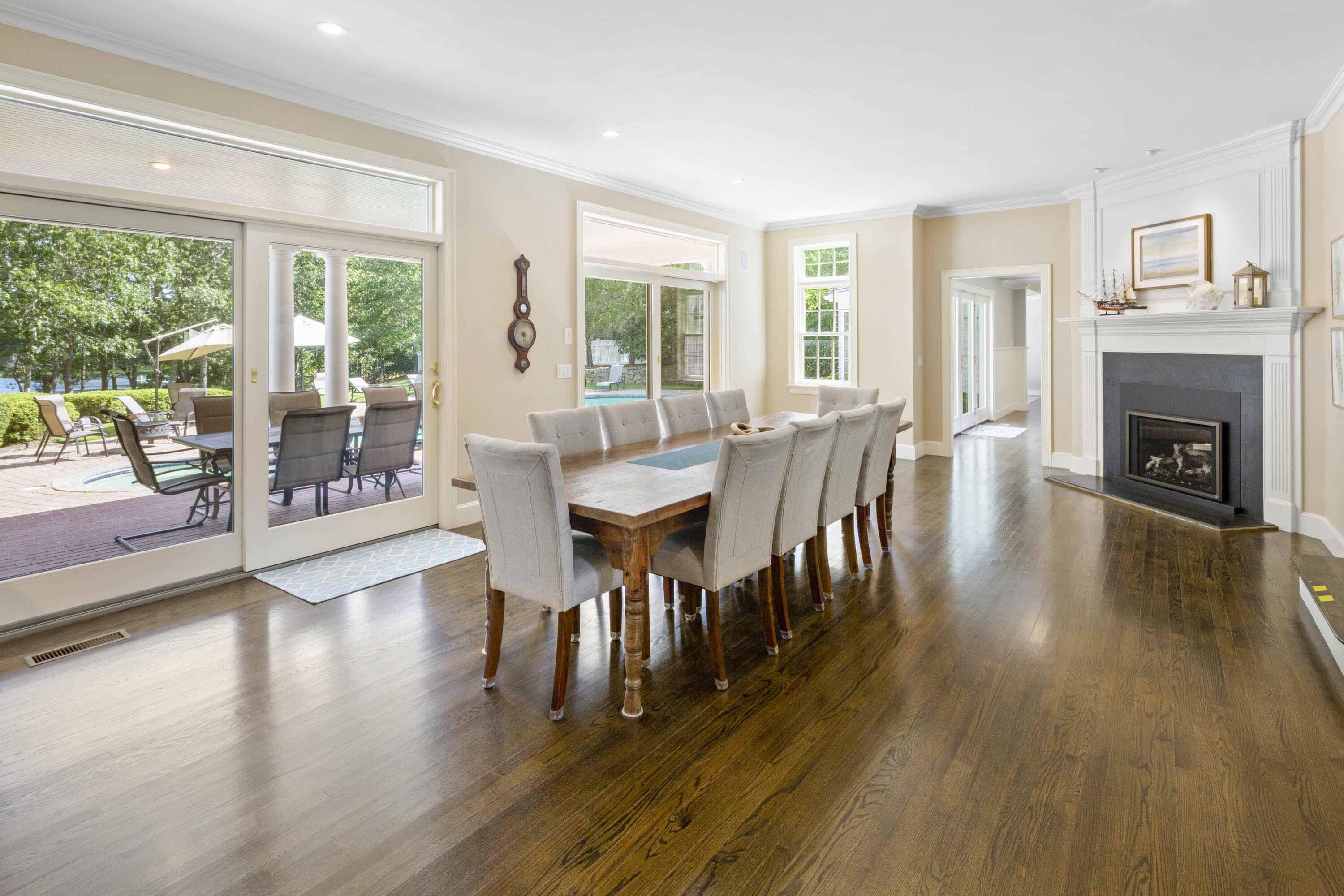 375 Baxter Neck Road Marstons Mills, MA 02648 - Photo 17 of 62 a view of a dining room with furniture window and wooden floor