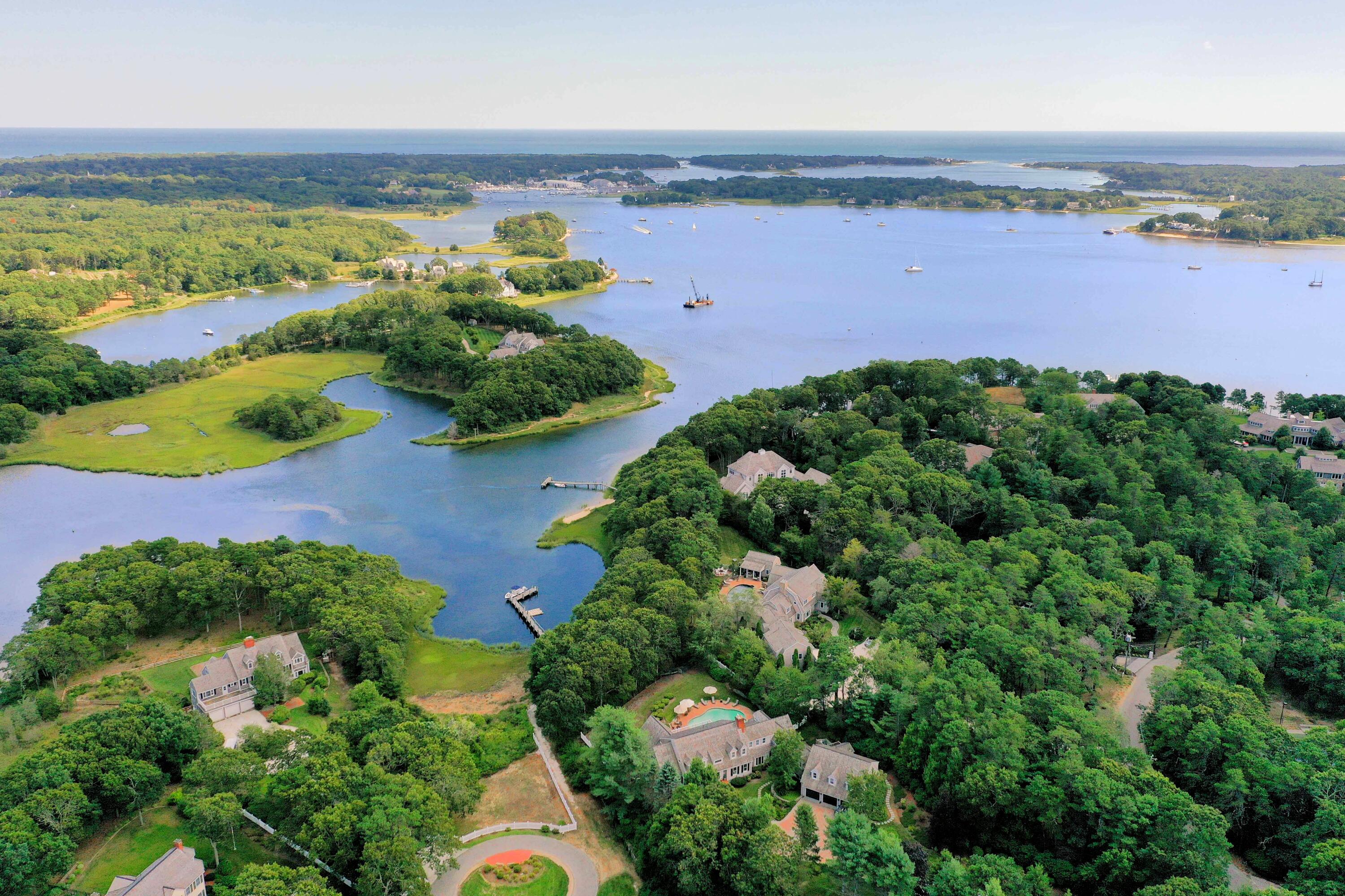 375 Baxter Neck Road Marstons Mills, MA 02648 - Photo 2 of 62 an aerial view of ocean and residential houses with outdoor space