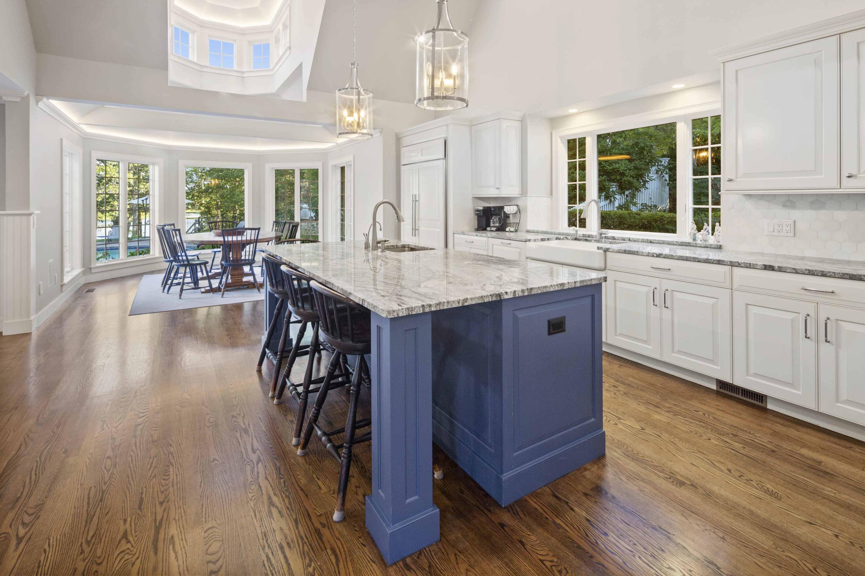 375 Baxter Neck Road Marstons Mills, MA 02648 - Photo 29 of 62 a kitchen with stainless steel appliances granite countertop wooden floors and table