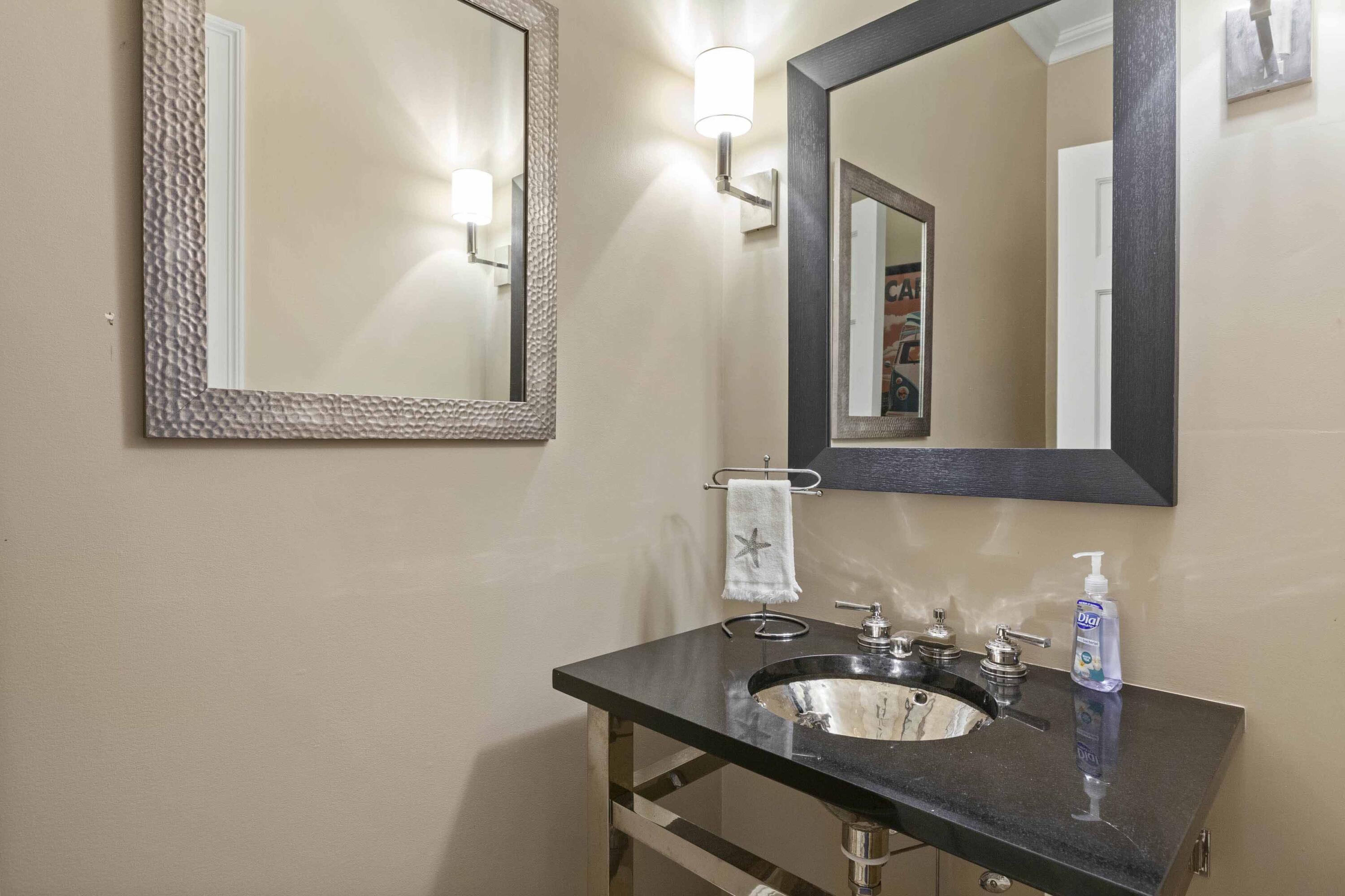 375 Baxter Neck Road Marstons Mills, MA 02648 - Photo 40 of 62 a bathroom with a sink a mirror and a toilet