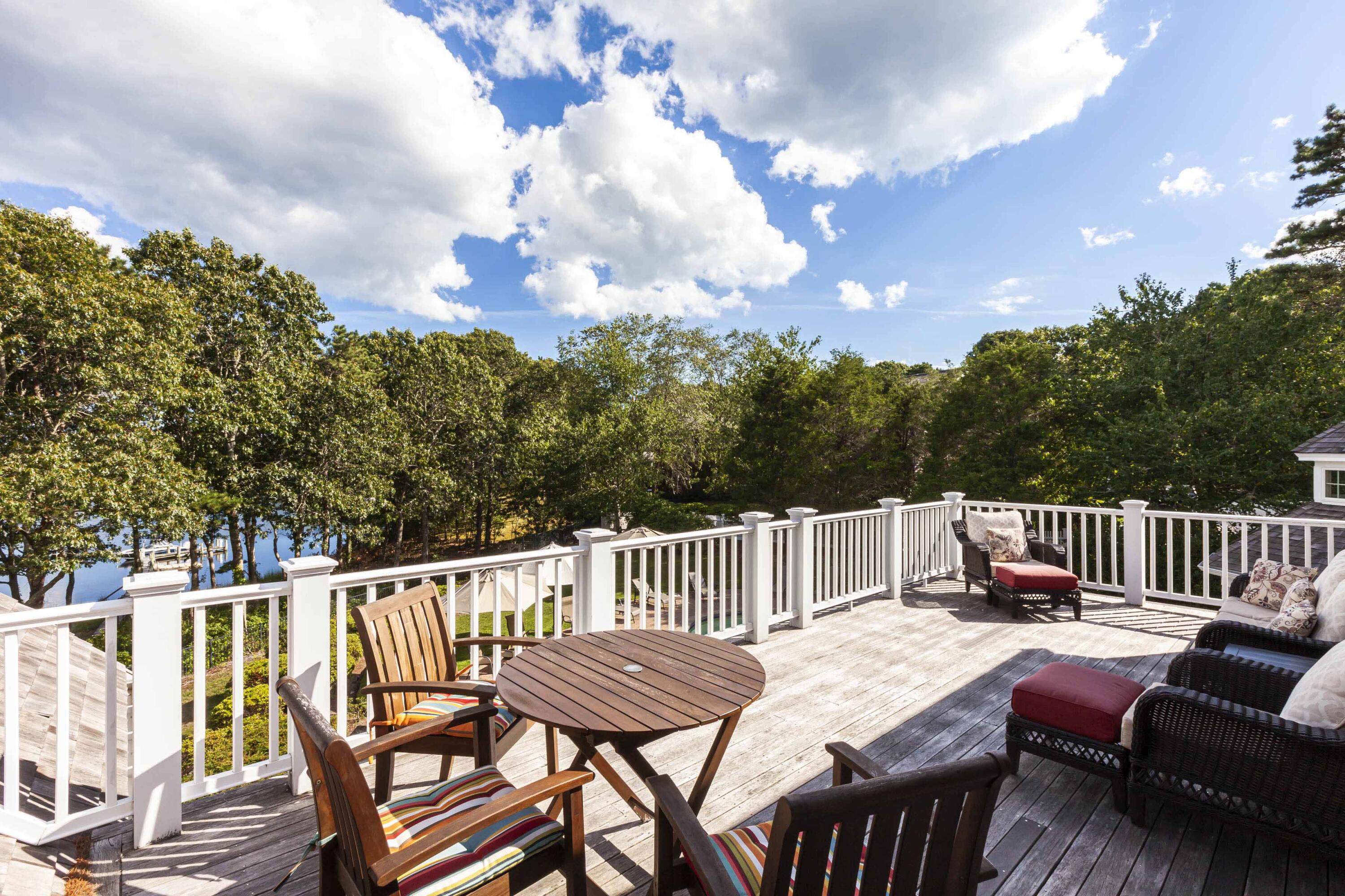 375 Baxter Neck Road Marstons Mills, MA 02648 - Photo 43 of 62 a view of a patio with a table