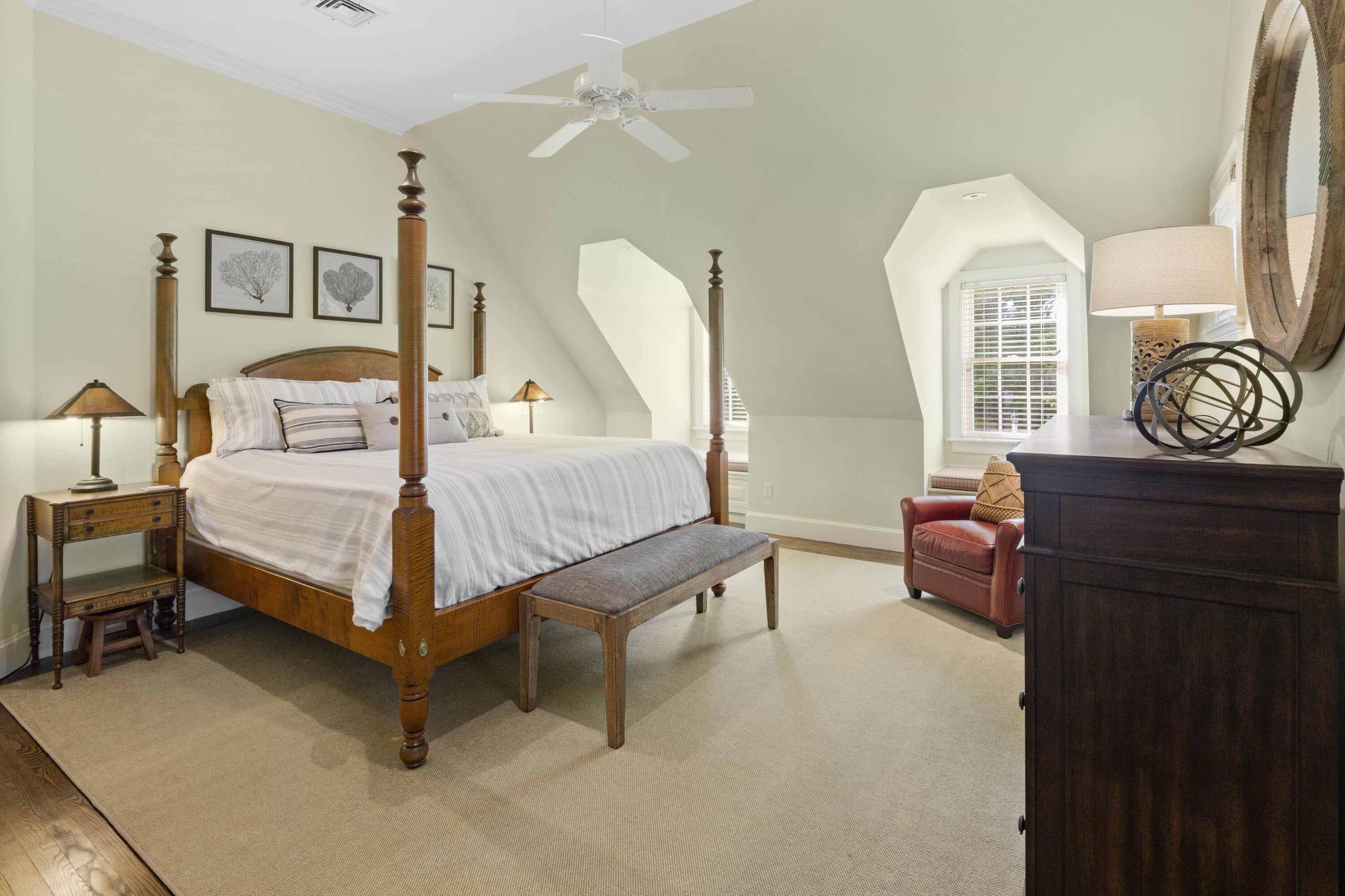 375 Baxter Neck Road Marstons Mills, MA 02648 - Photo 44 of 62 a bedroom with a bed and wooden floor