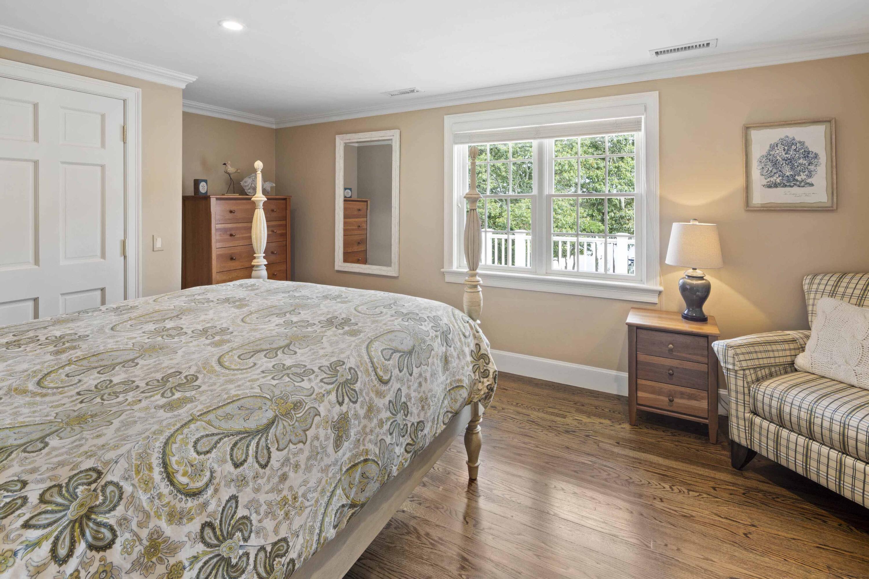 375 Baxter Neck Road Marstons Mills, MA 02648 - Photo 48 of 62 a spacious bedroom with a bed and a couch