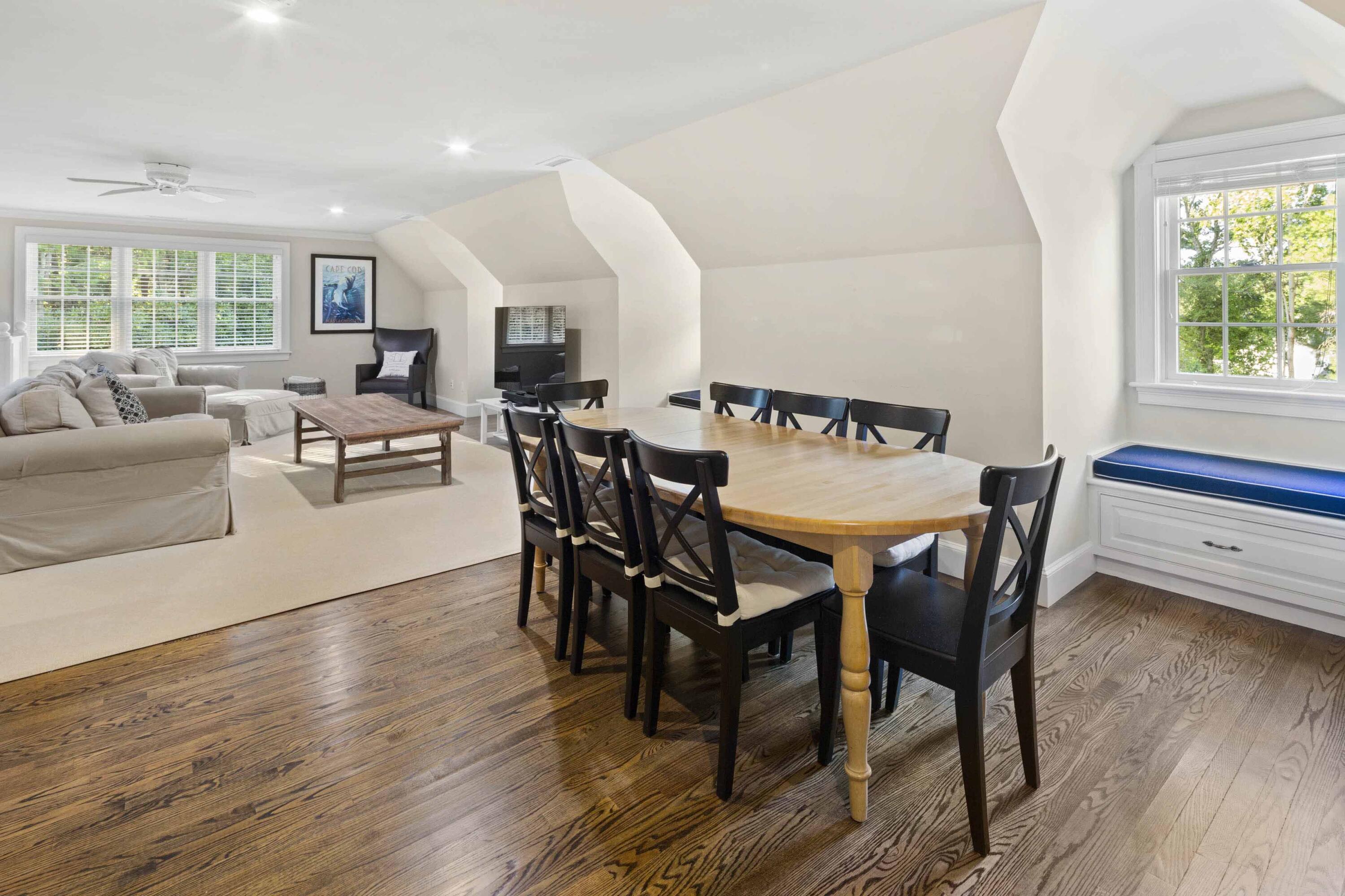 375 Baxter Neck Road Marstons Mills, MA 02648 - Photo 52 of 62 a view of a dining room with furniture and wooden floor