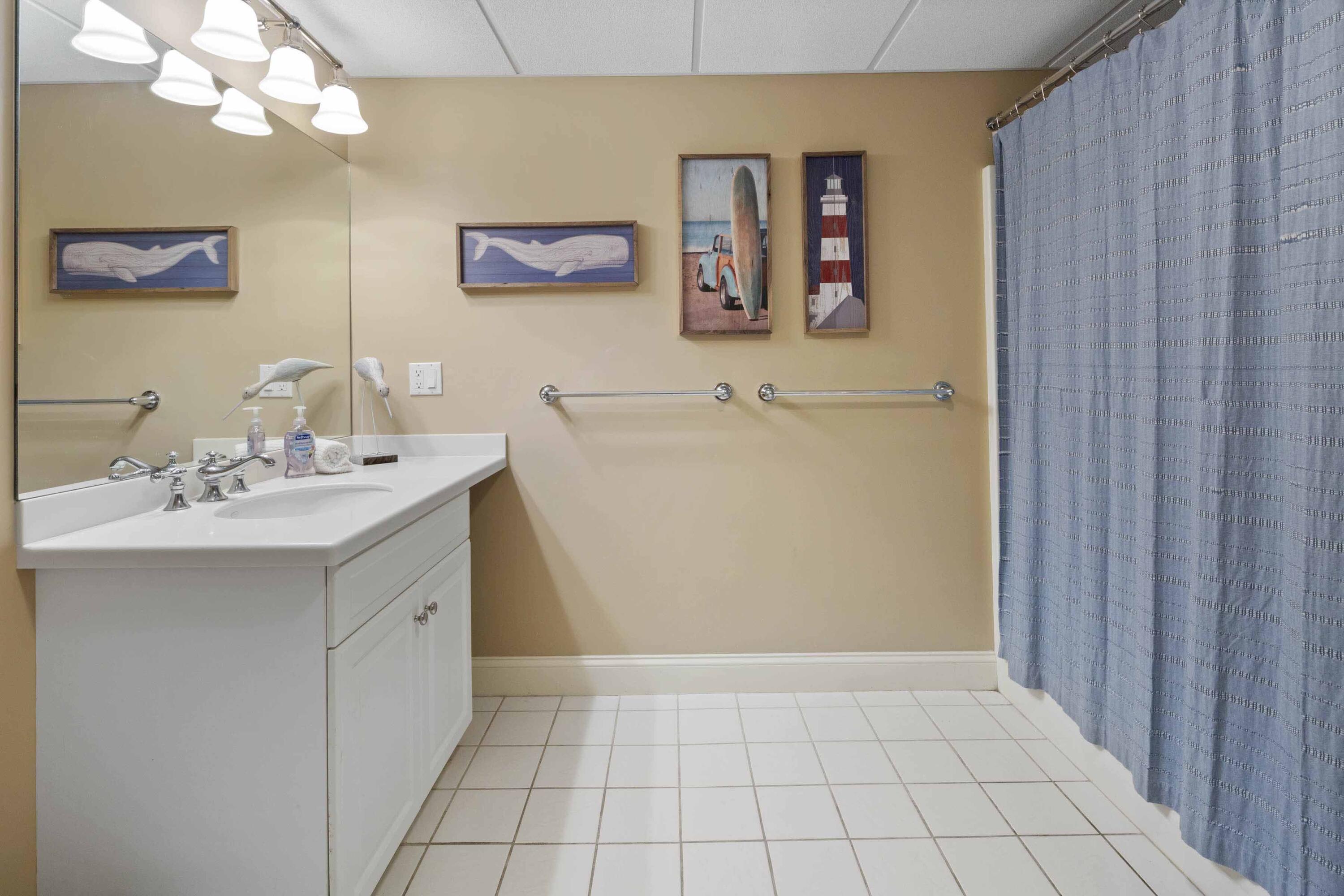 375 Baxter Neck Road Marstons Mills, MA 02648 - Photo 58 of 62 a bathroom with a sink a vanity and a mirror