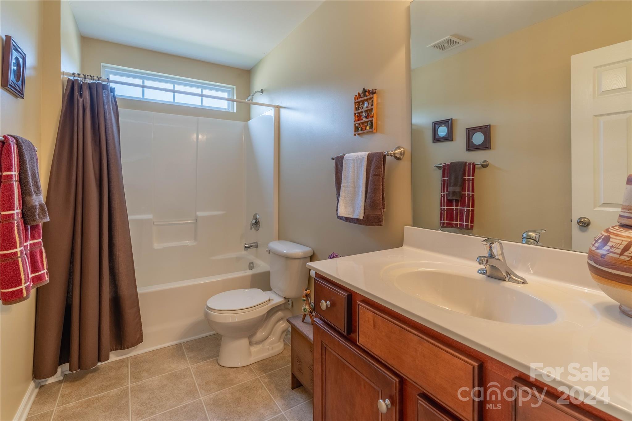 3359 Merchant Lane Davidson, NC 28036 - Photo 26 of 48 a bathroom with a sink toilet and shower