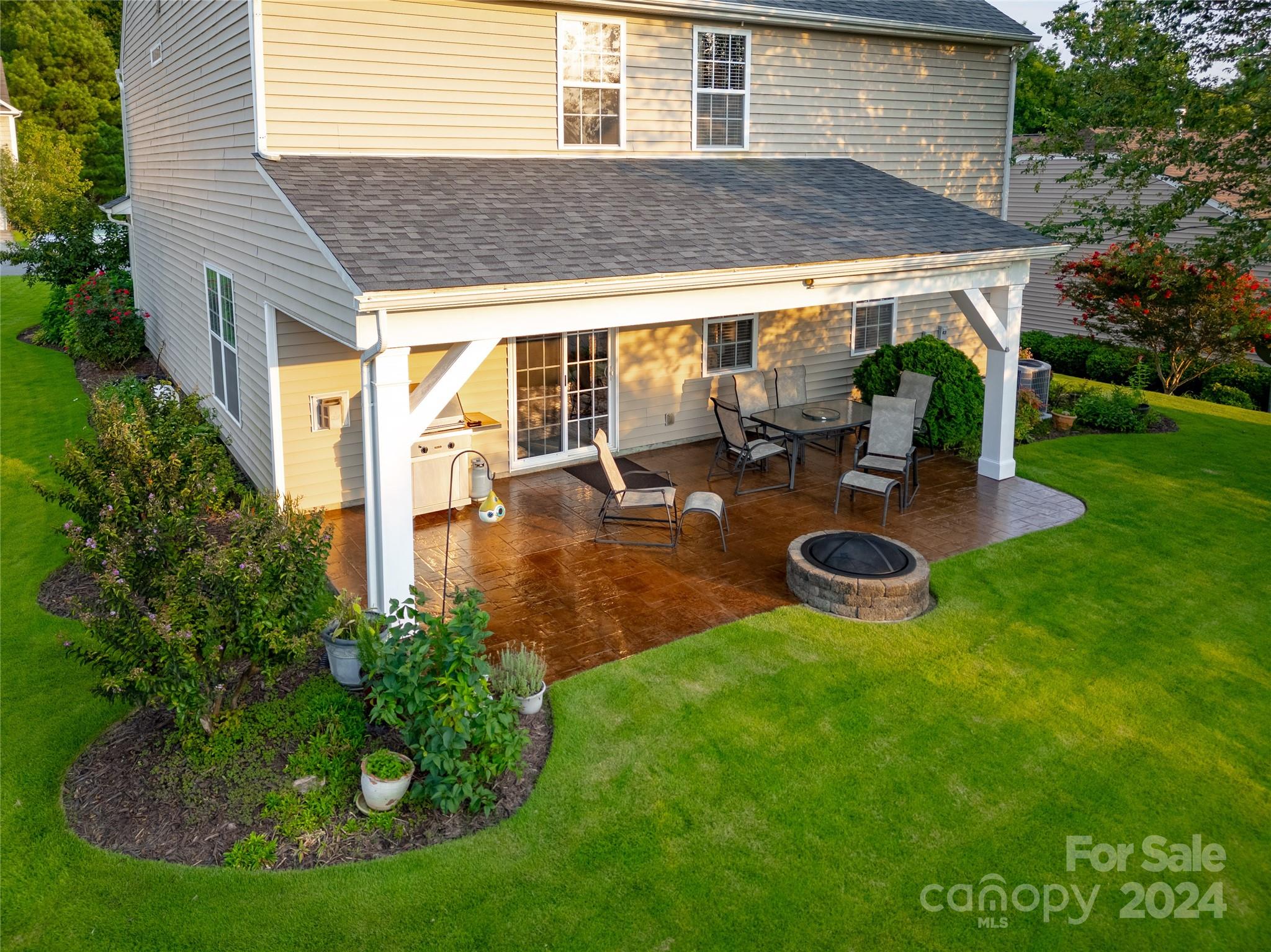 3359 Merchant Lane Davidson, NC 28036 - Photo 30 of 48 a view of a house with backyard porch and sitting area