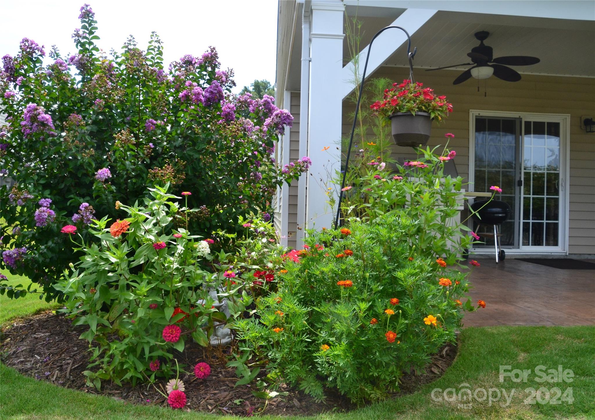 3359 Merchant Lane Davidson, NC 28036 - Photo 36 of 48 a flower plants in front of the house
