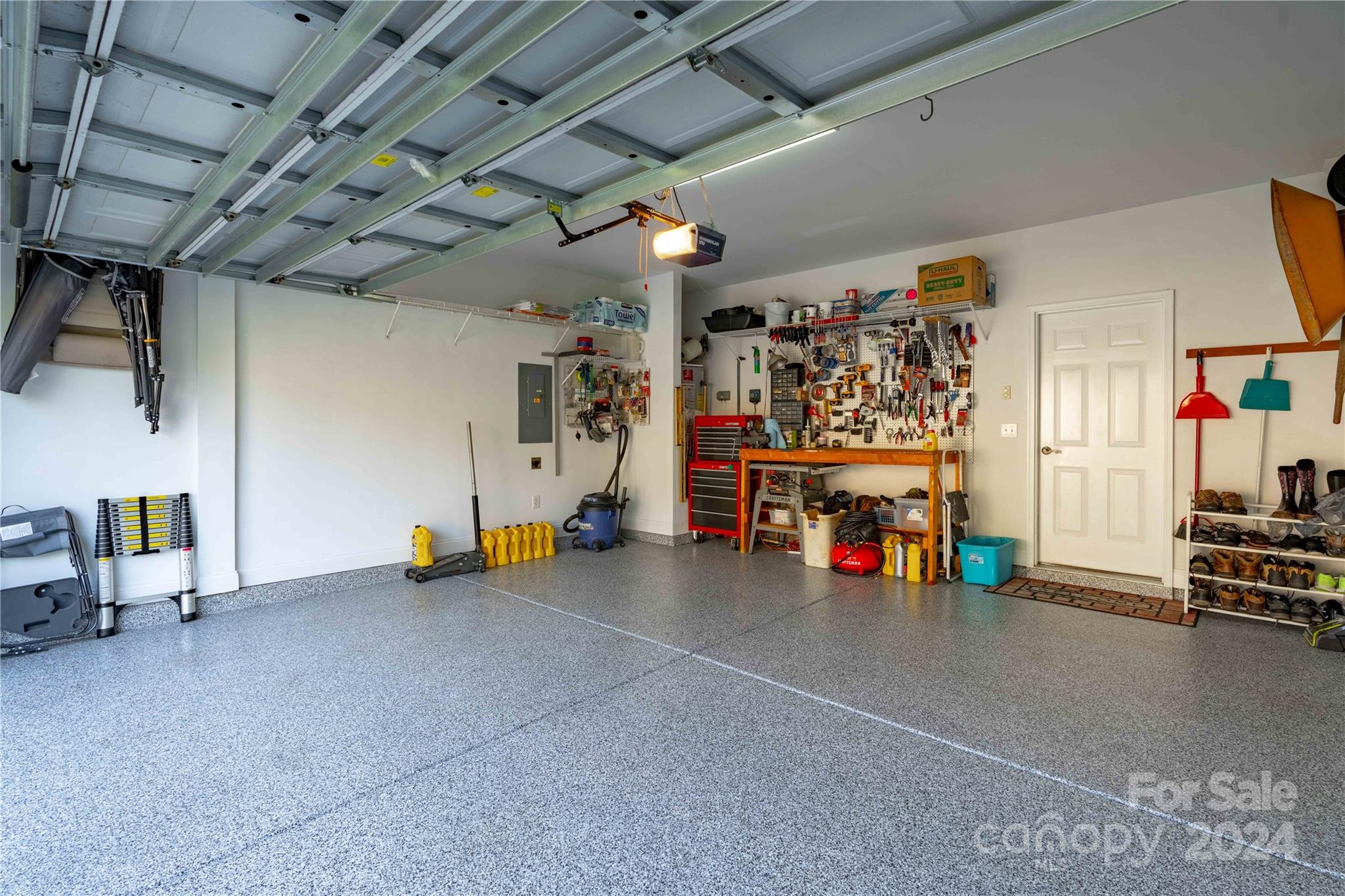 3359 Merchant Lane Davidson, NC 28036 - Photo 38 of 48 a view of a garage with the kitchen