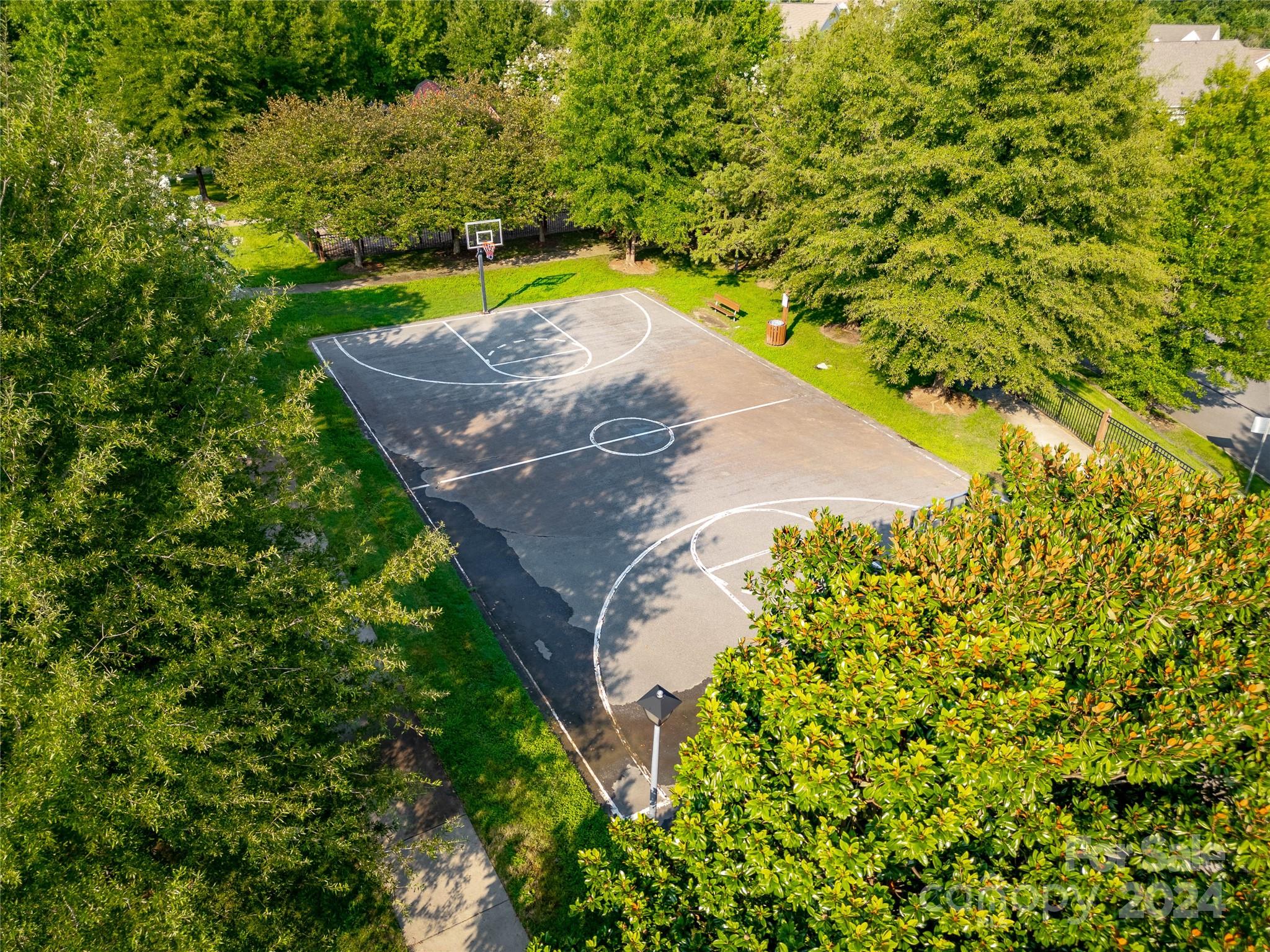 3359 Merchant Lane Davidson, NC 28036 - Photo 46 of 48 a view of a yard with a small house