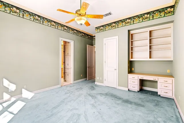 a bathroom with a sink a vanity and a mirror
