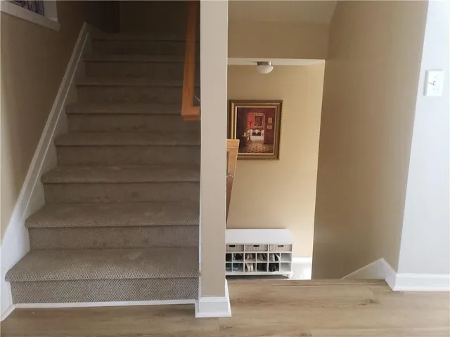 a backyard of a house with lots of green space