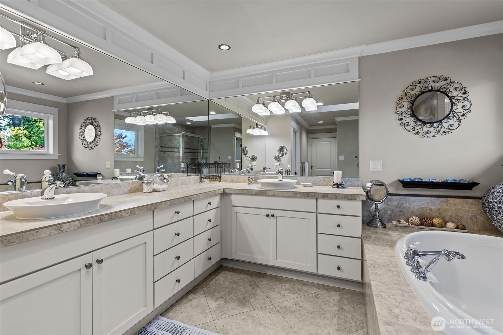 8614 Northeast 198th Street Bothell, WA 98011 - Photo 19 of 40 a spacious bathroom with a granite countertop sink mirror and bathtub