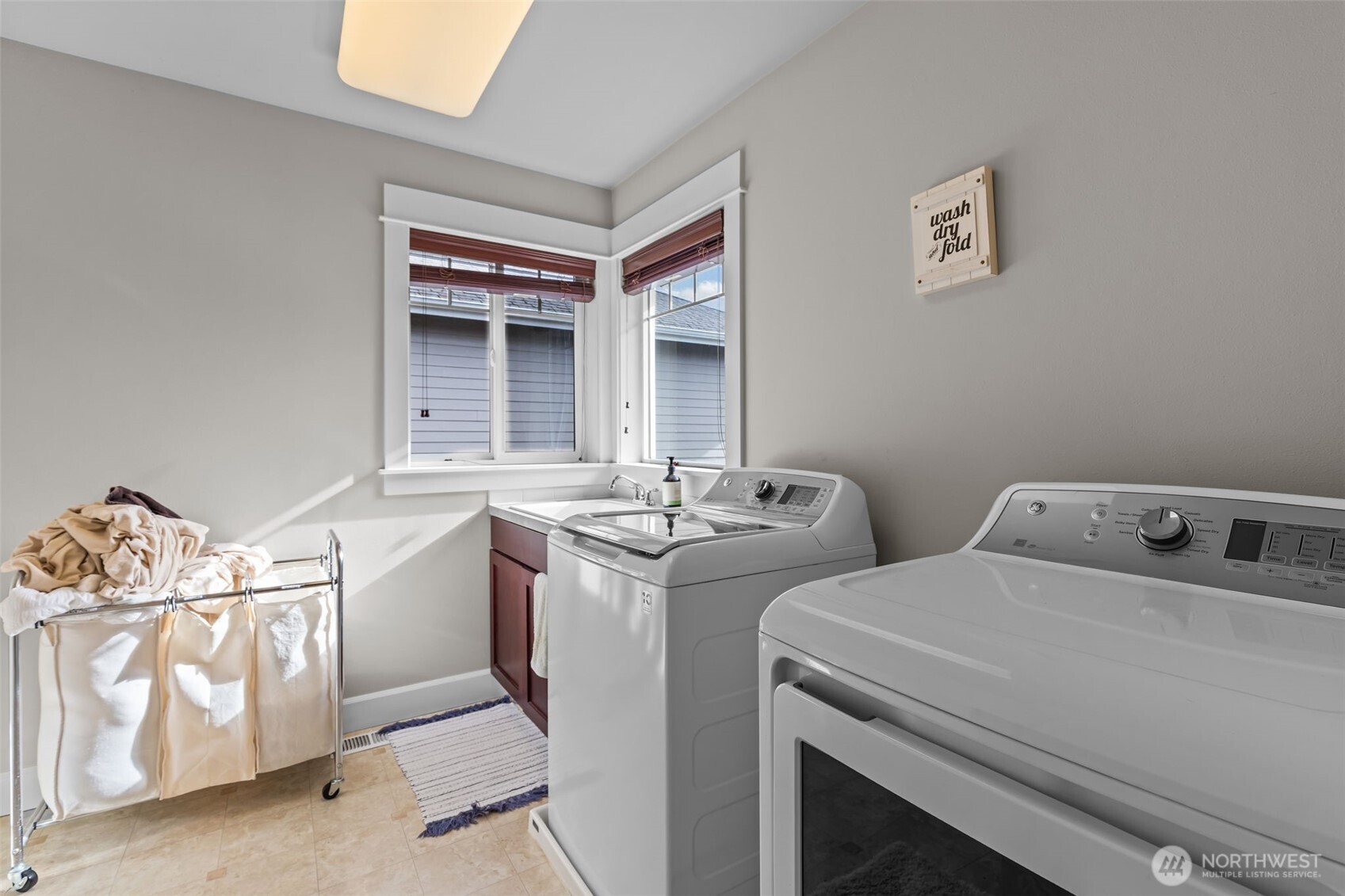 8614 Northeast 198th Street Bothell, WA 98011 - Photo 31 of 40 a utility room with dryer and washer