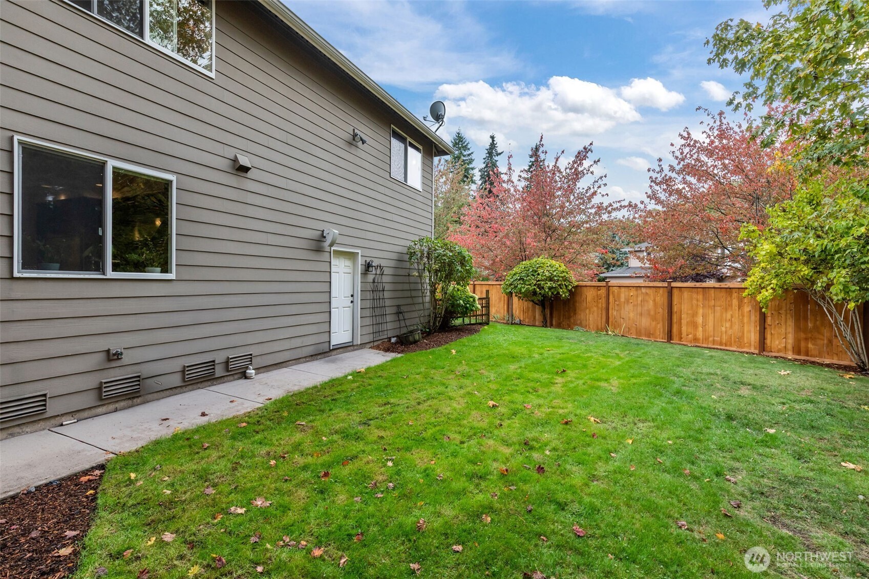 8614 Northeast 198th Street Bothell, WA 98011 - Photo 34 of 40 a view of a backyard with a garden