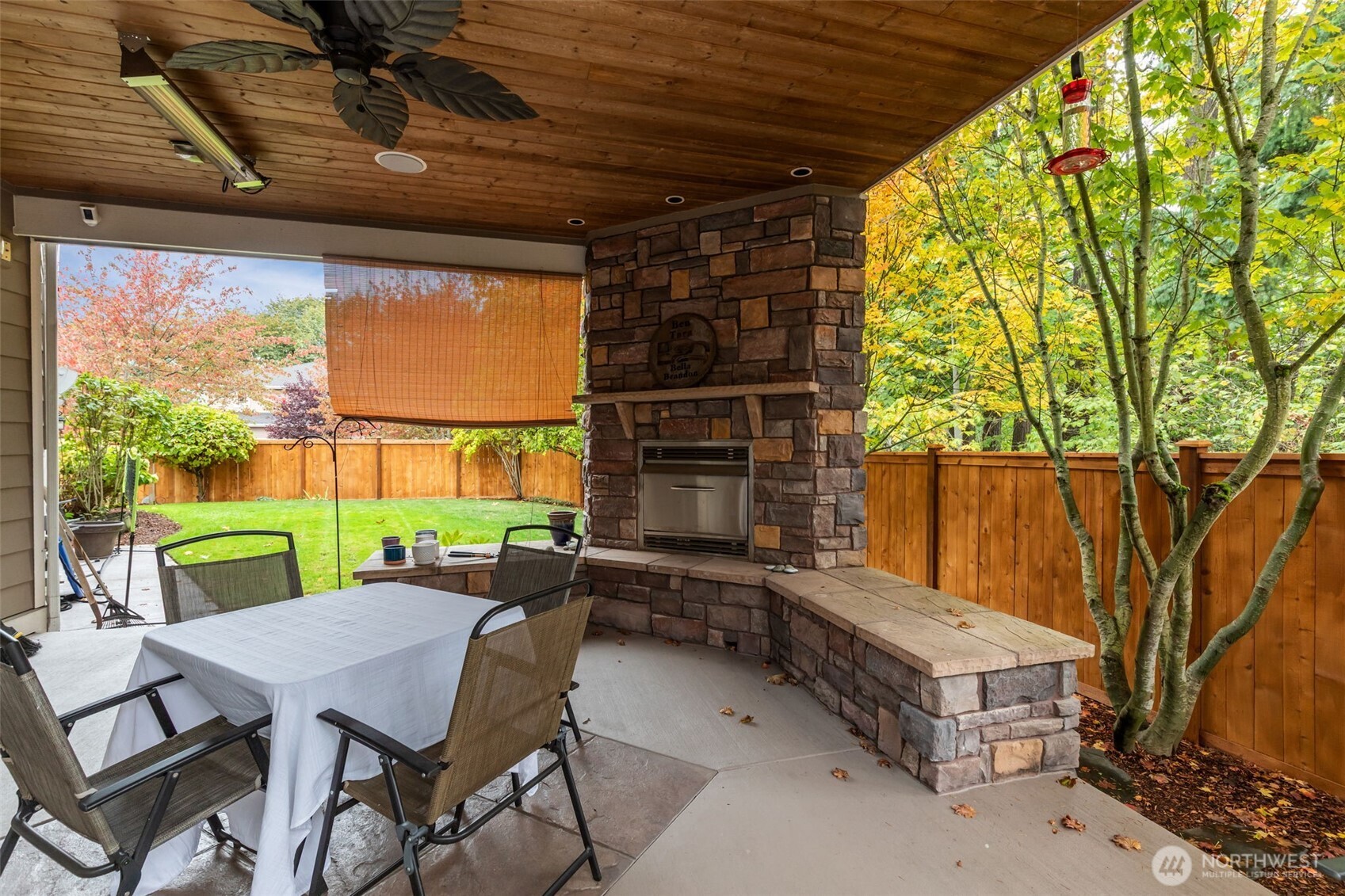 8614 Northeast 198th Street Bothell, WA 98011 - Photo 36 of 40 a backyard of a house with a garden and outdoor seating