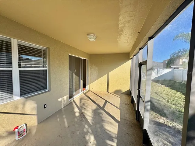 a balcony view with a outdoor seating space
